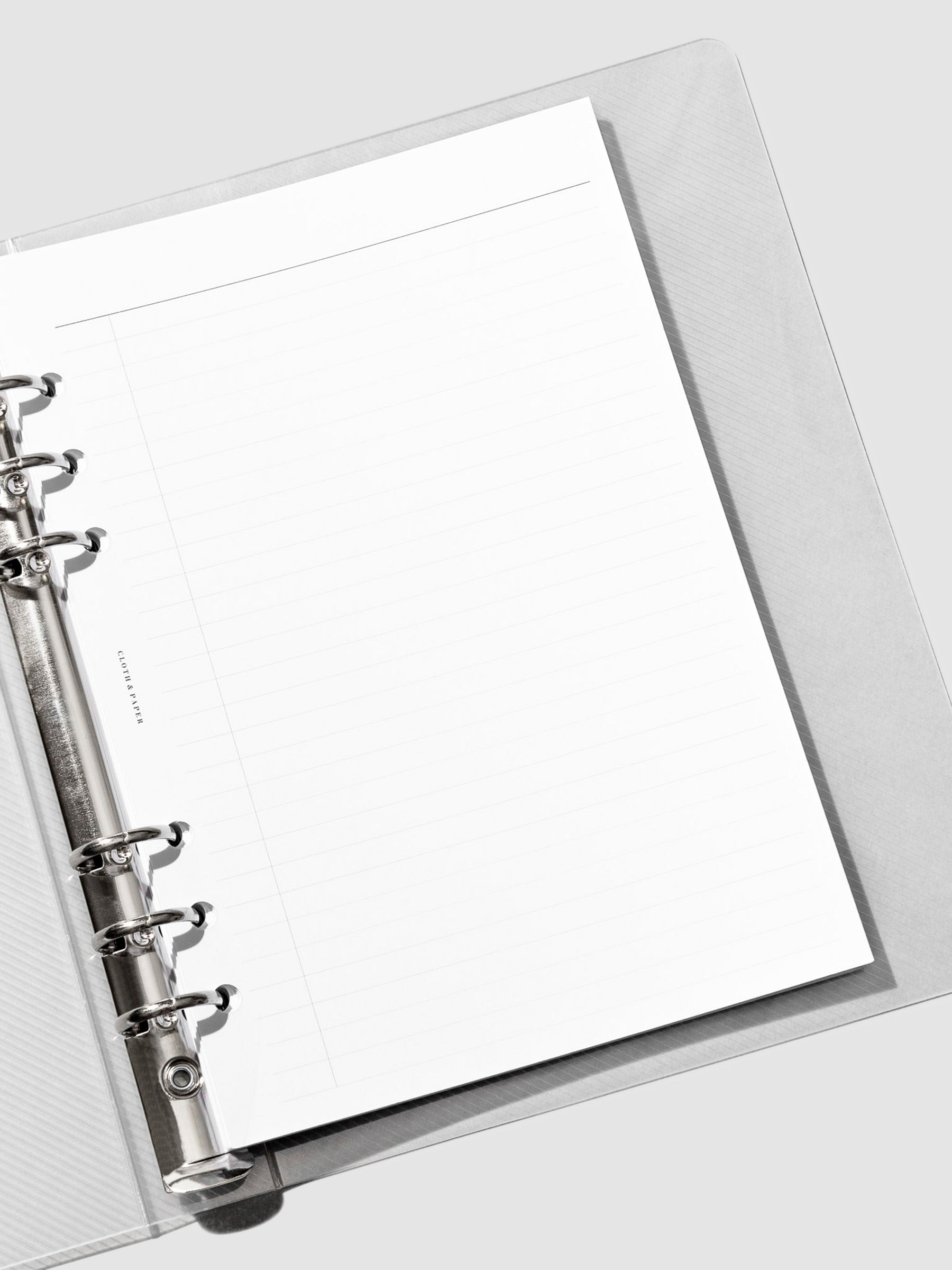 Textured Plastic Binder shown open with A5 planner inserts in ring binding.