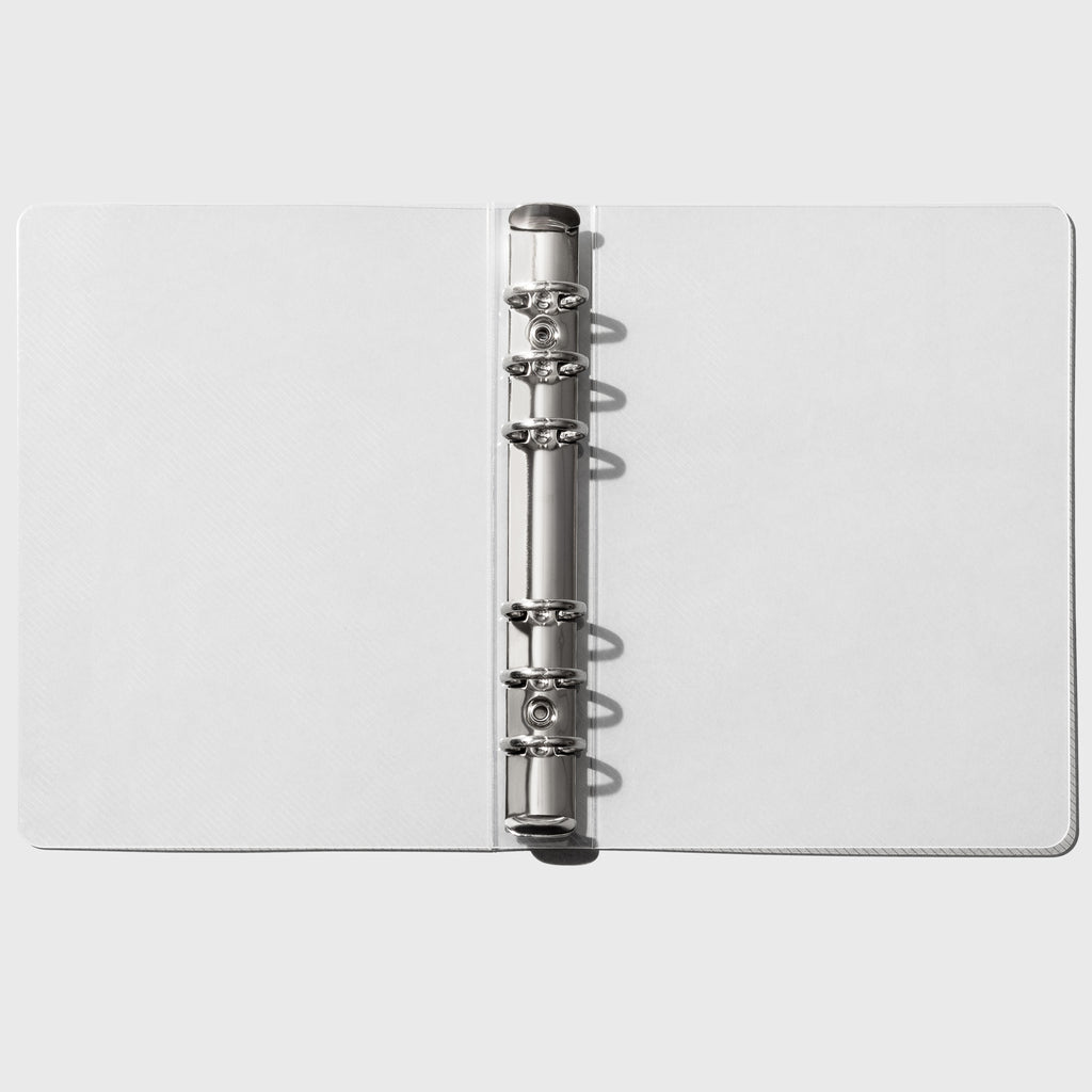 Open empty transparent binder on a white background.