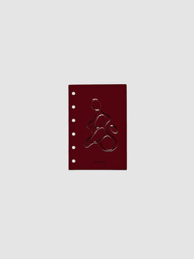 Dark red, semi-transparent, and glossy plastic planner dashboard with organic raised shape design in size Pocket on a neutral background.