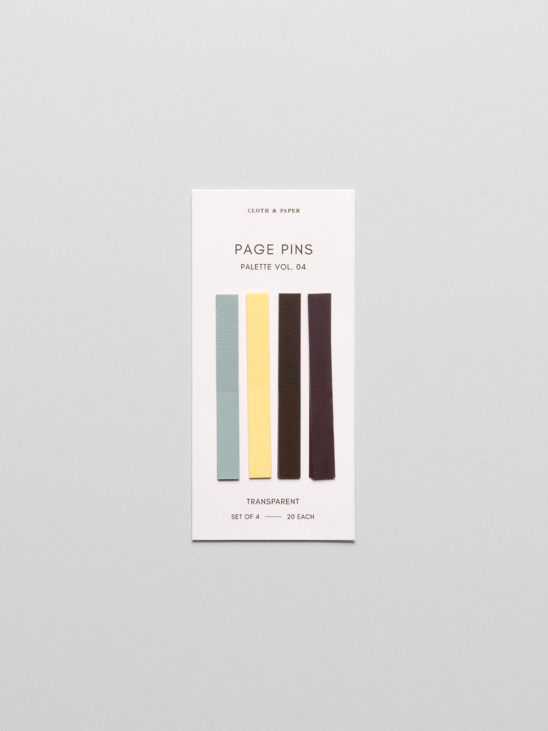 Page Pins Vol. 4 in colors Smoked Salt (blue), Mallorca (yellow), Walnut (brown), and Bordeaux (Burgundy) shown on backing card on a neutral background.