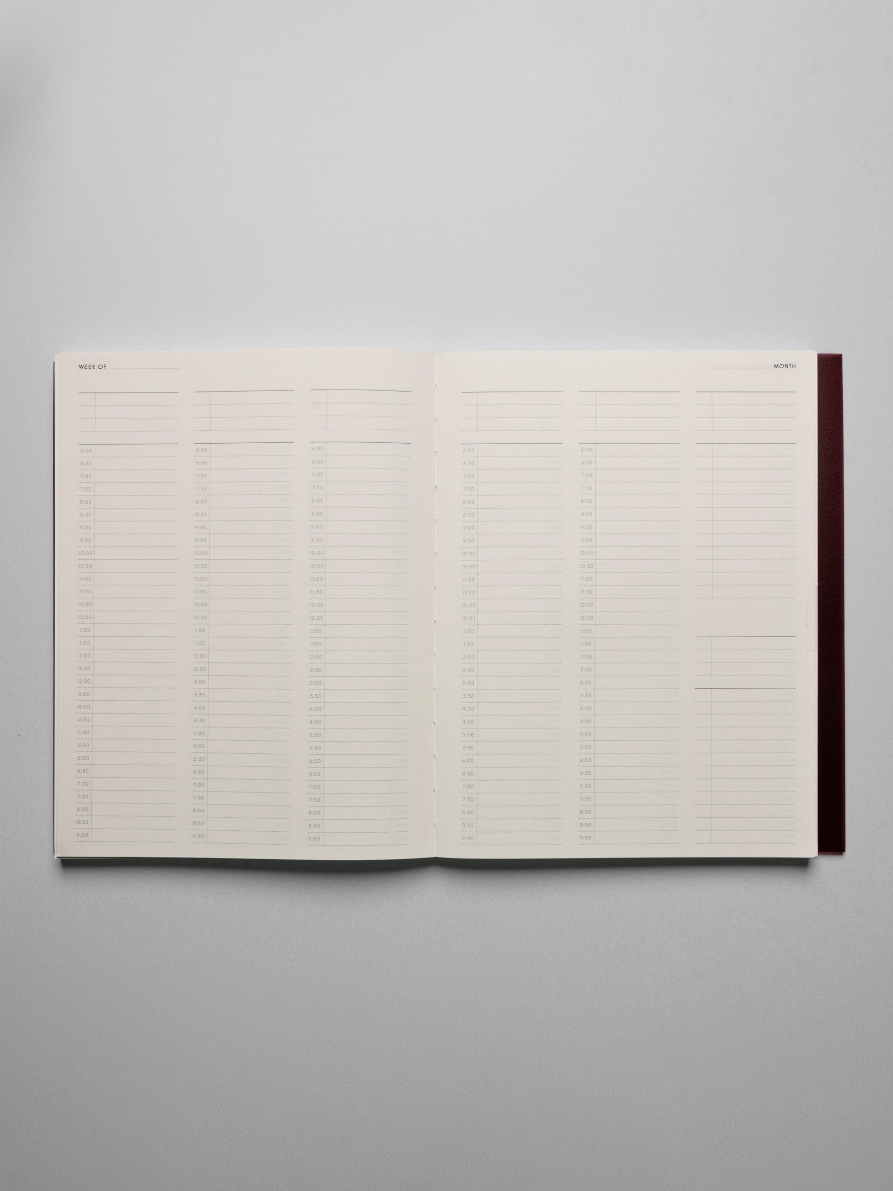 Perfect Bound Notebook in size HP Classic with 30 Minute Time Block pages shown laid flat displaying both pages for a full week's layout.