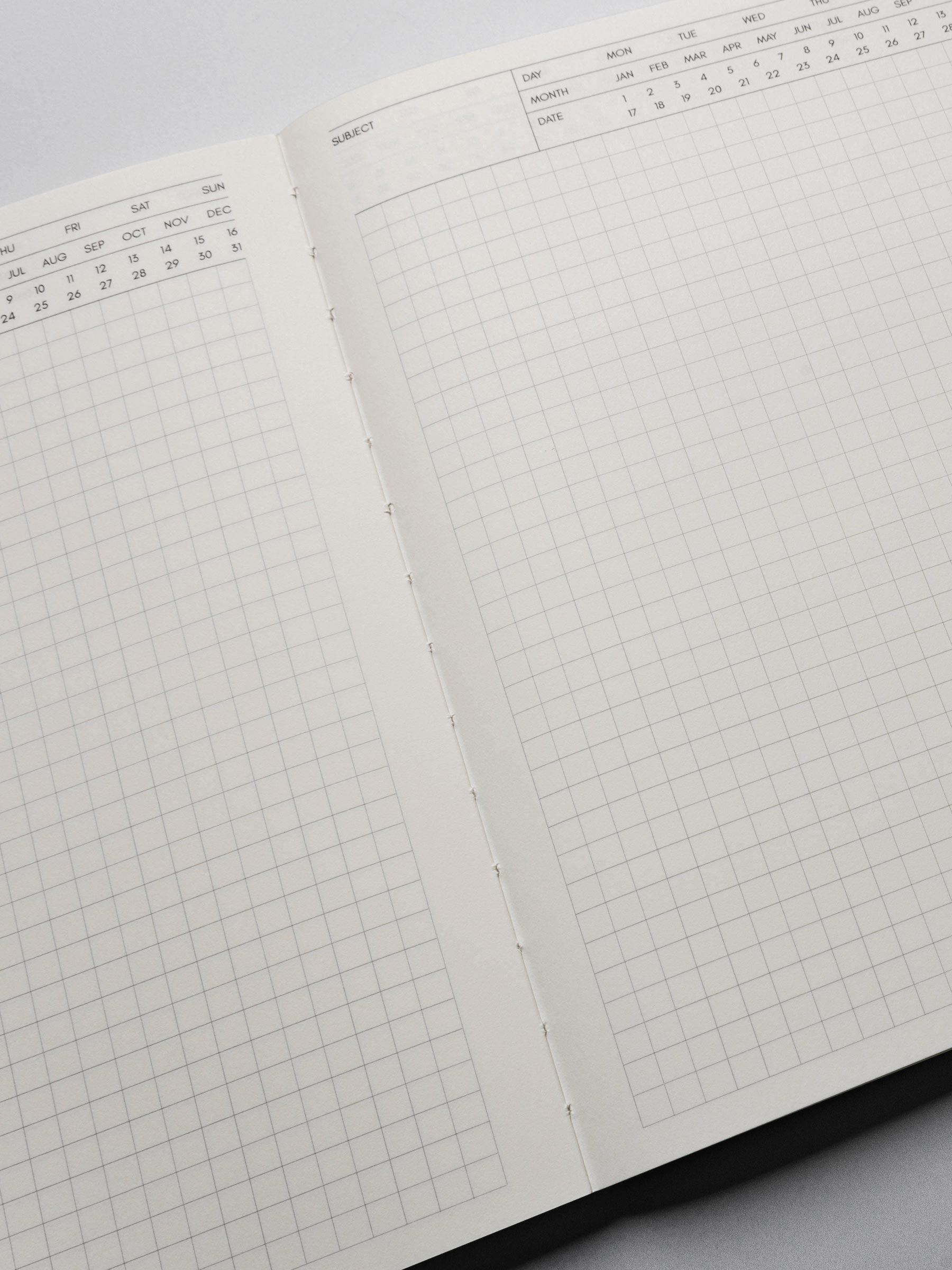 Perfect Bound Notebook in size HP Classic with Executive Notes pages shown close up, showing the center binding with the pages open.