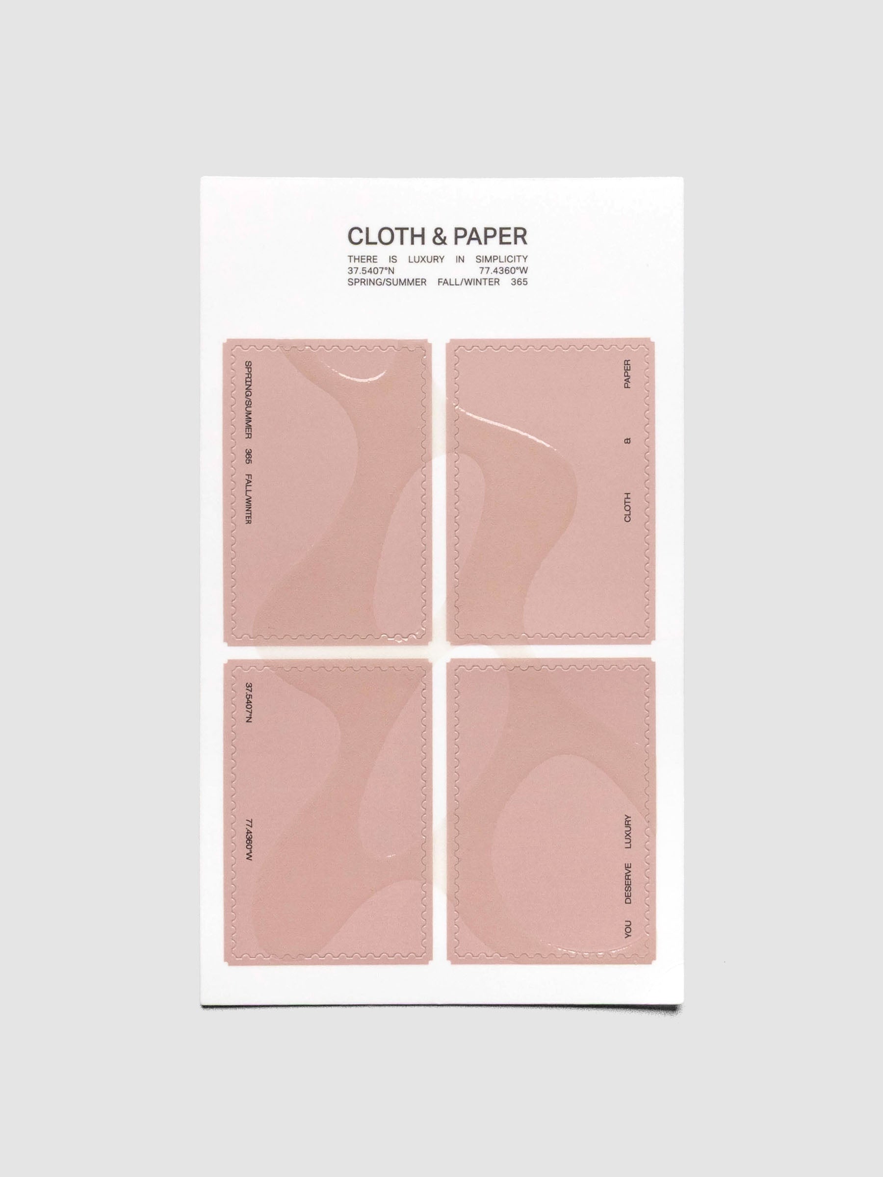 One sheet of four stamp shaped stickers in pink with a gloss organic shape design.