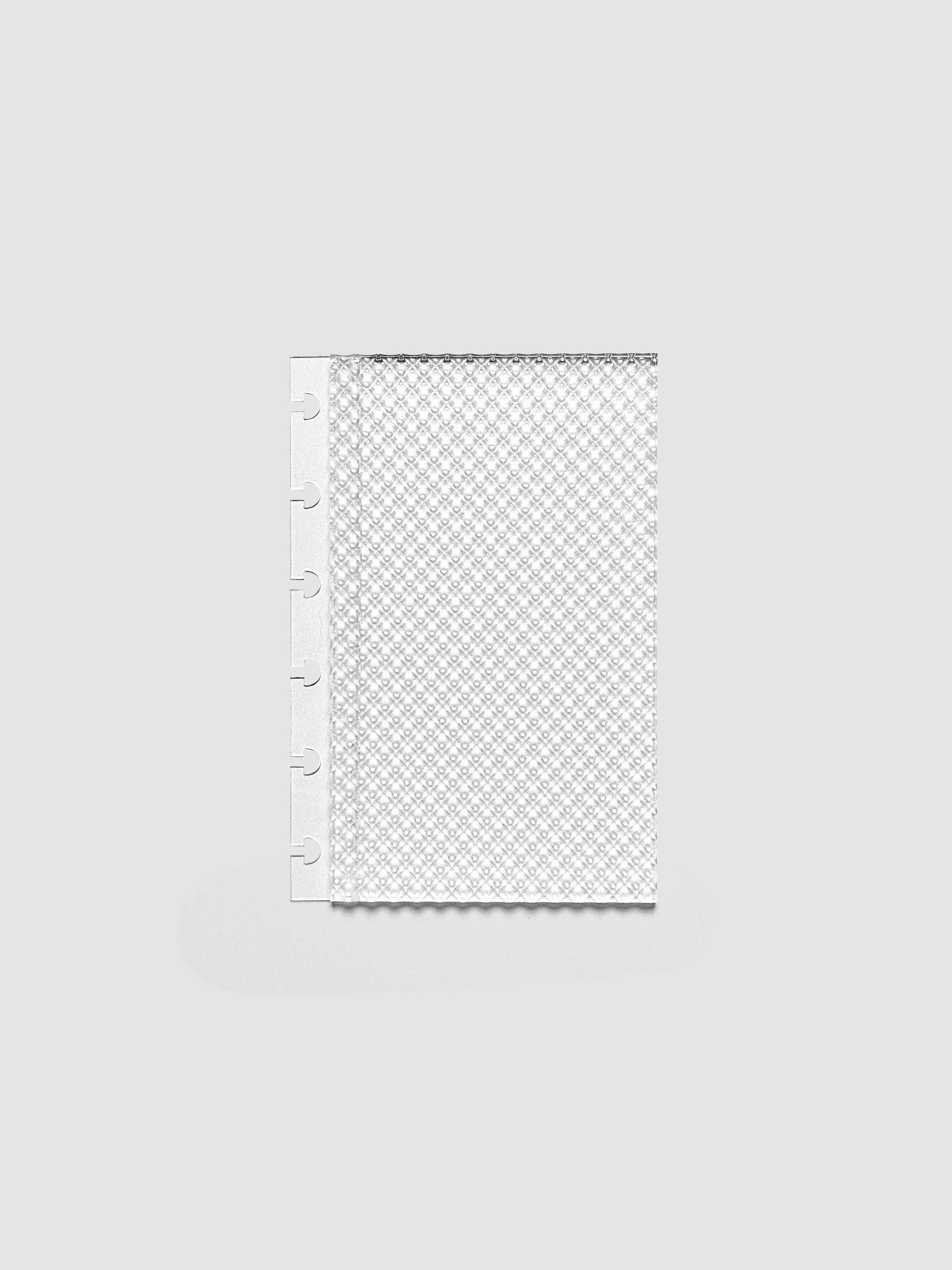 Clear, textured Studded Planner Dashboard in the size CP Petite, on a neutral background.