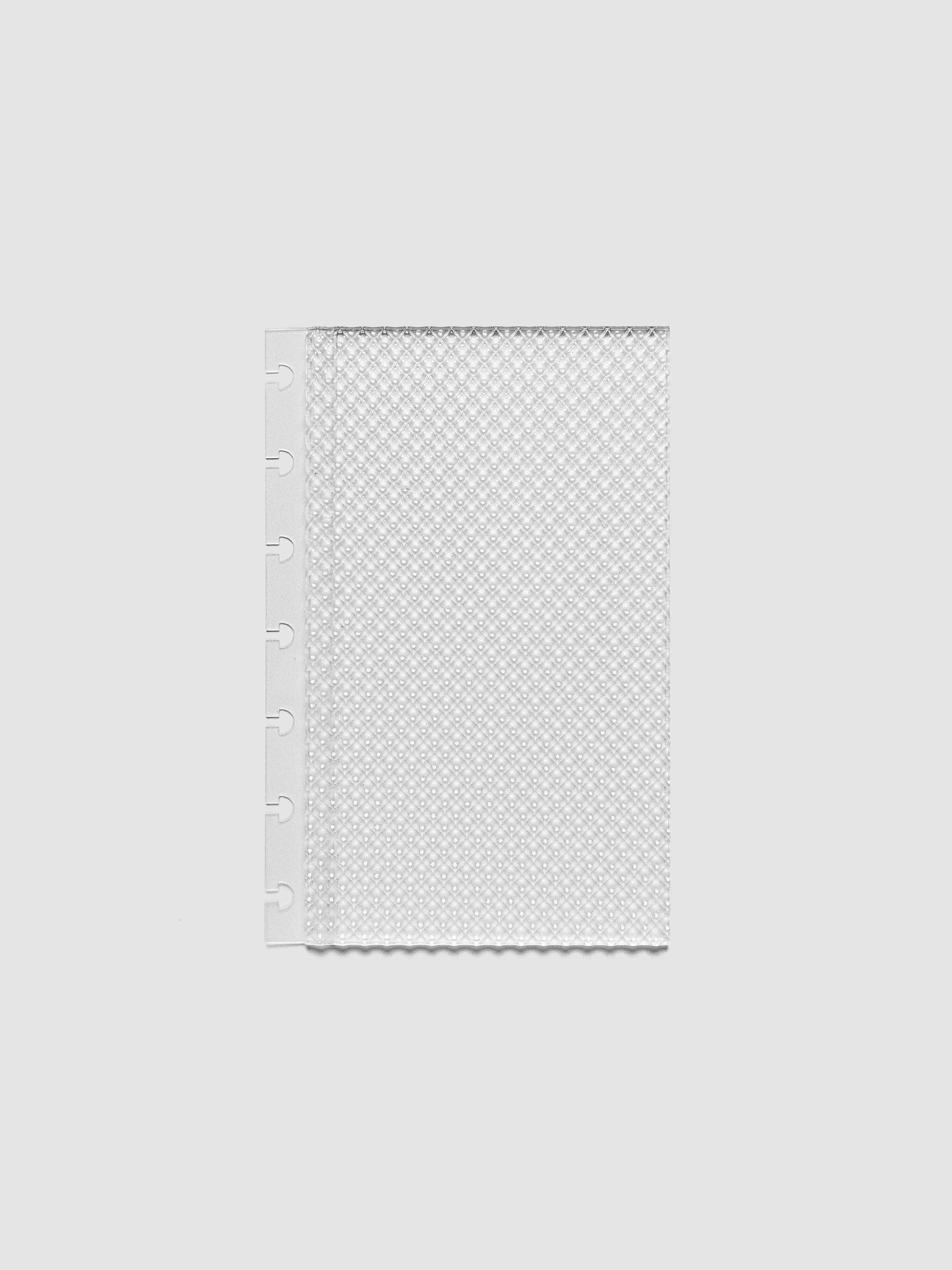Clear, textured Studded Planner Dashboard in the size HP Mini, on a neutral background.