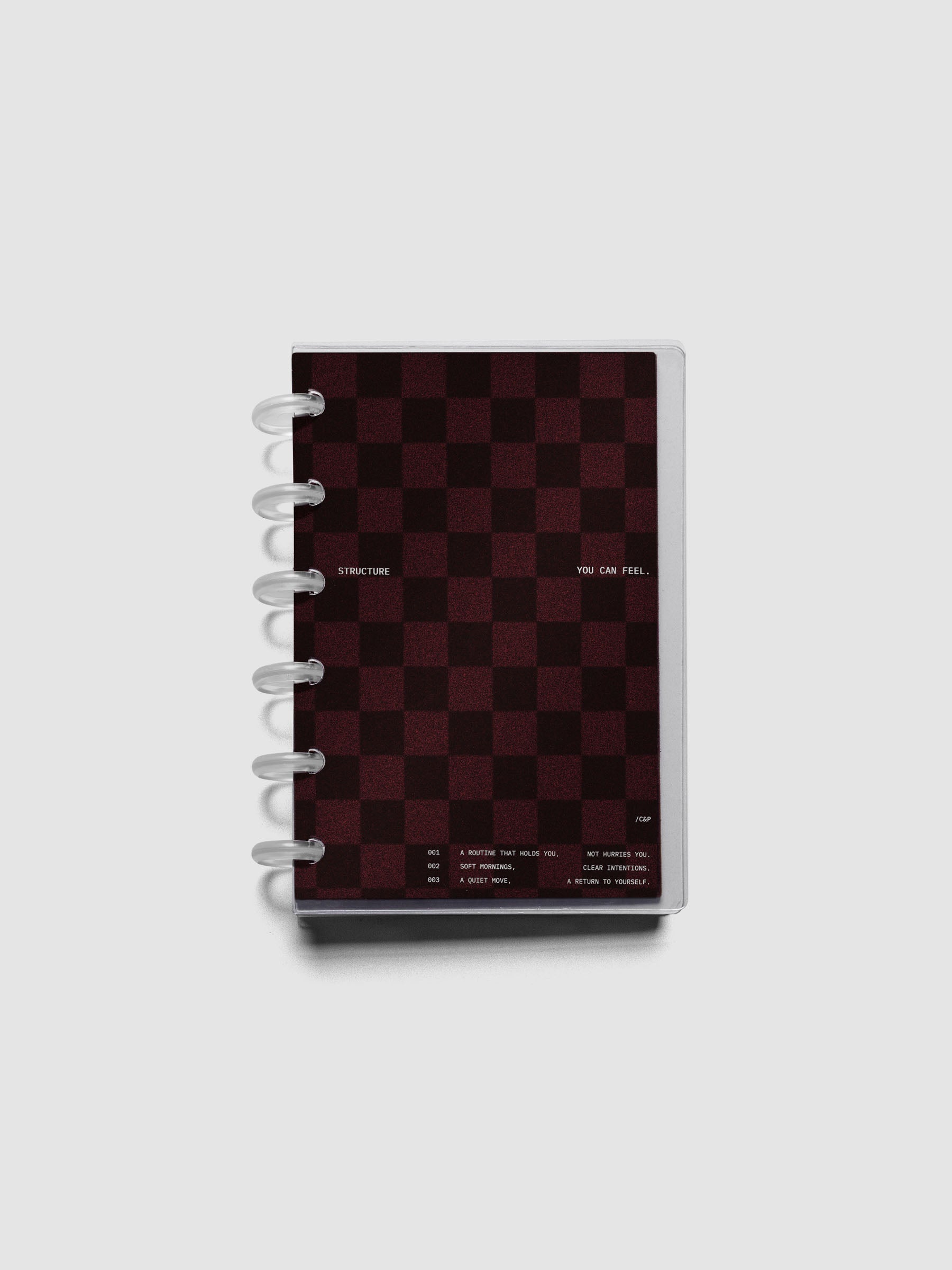 CP Petite sized velvet checkered dashboard in the color Bordeaux with crystal clear planner dashboard shown discbound.