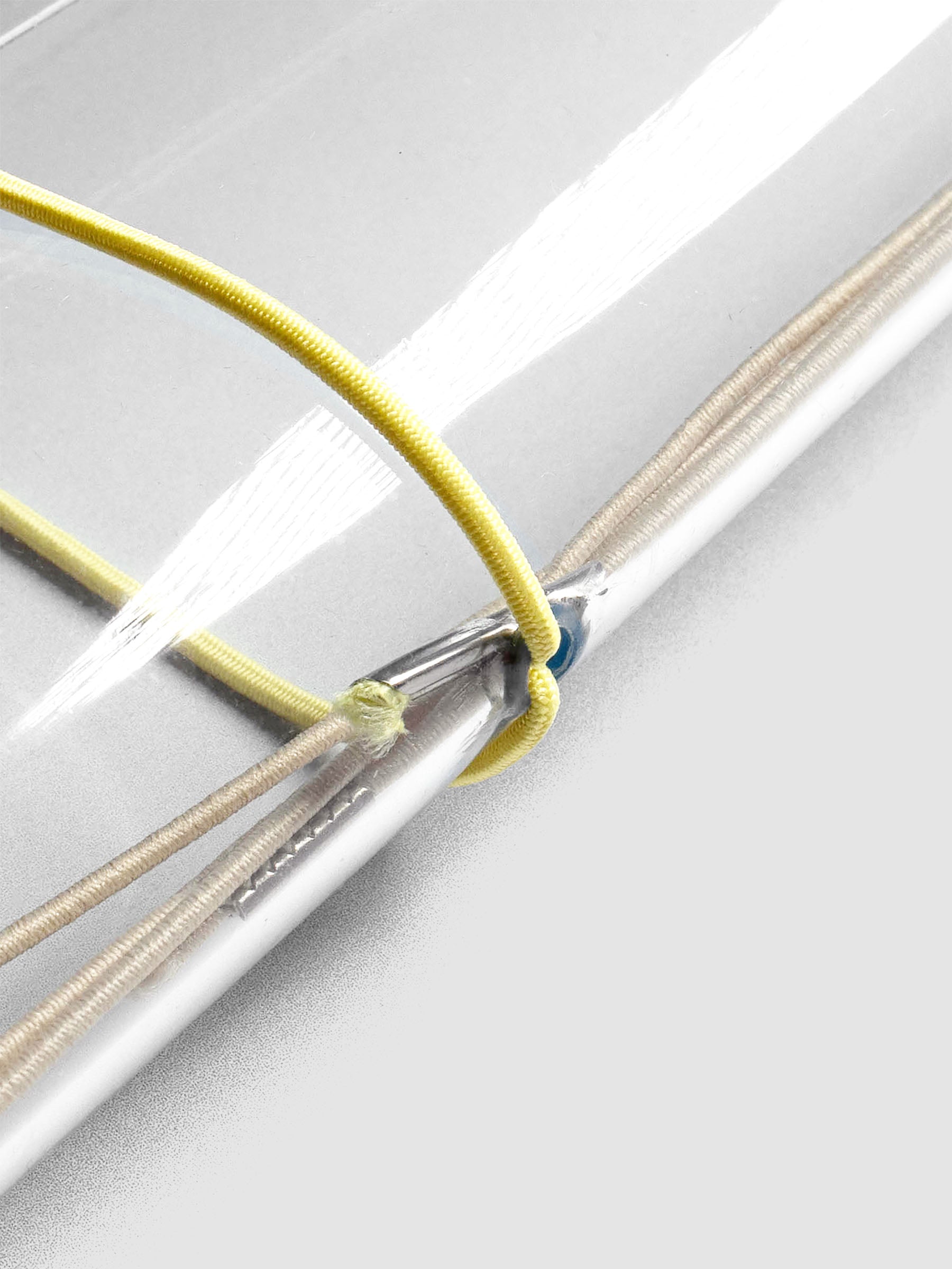 Close up image of the light yellow exterior band in use with a vinyl cover