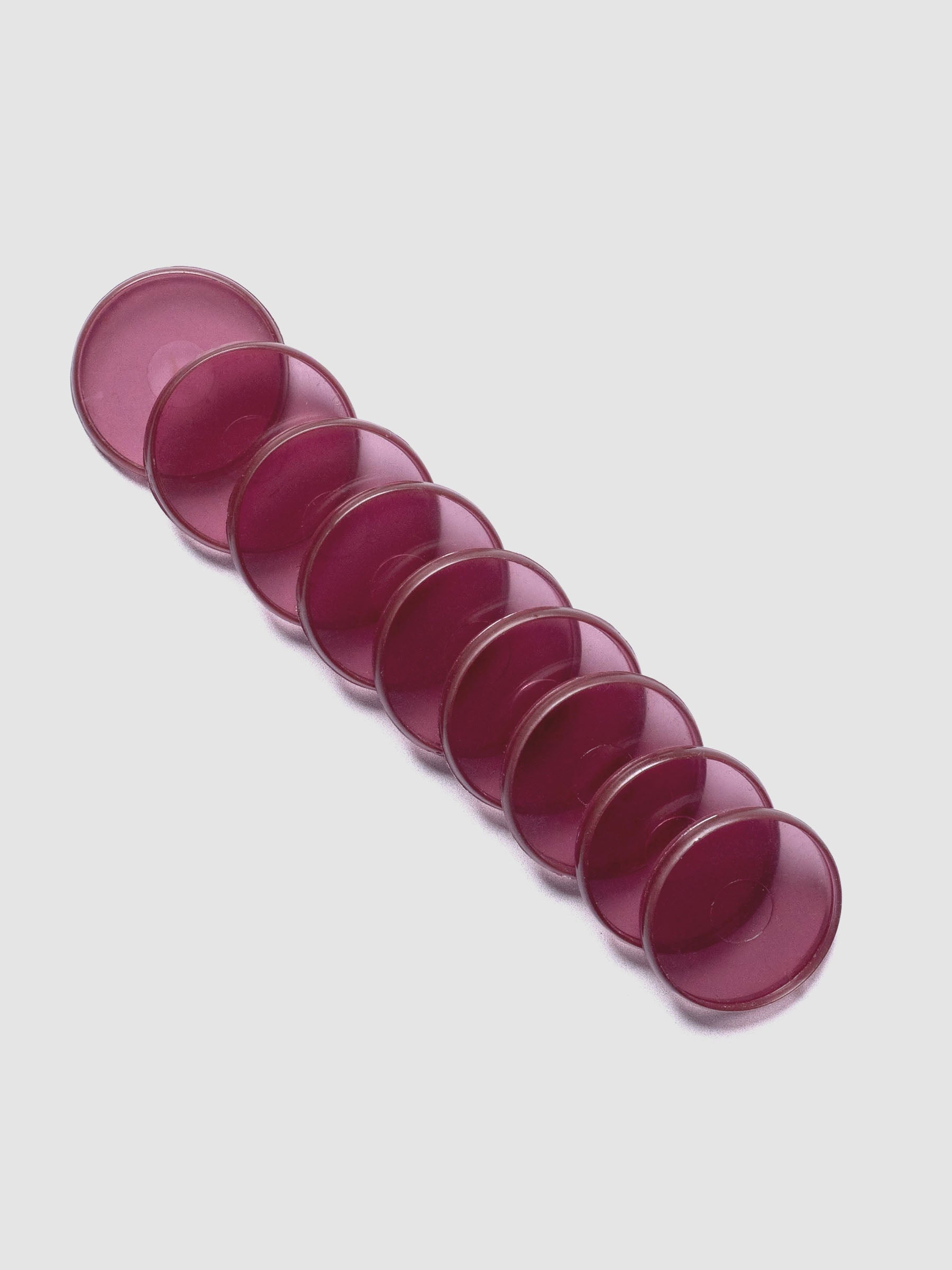 Set of nine transparent, red-hued, planner discs in size 1.25 in.