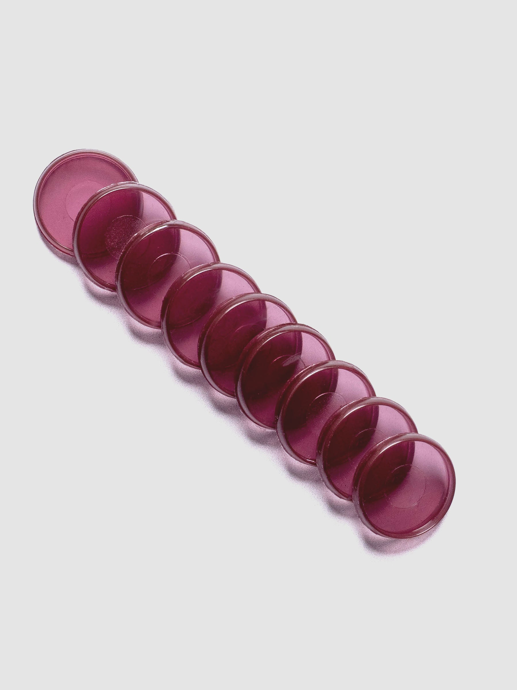 Set of nine transparent, red-hued, planner discs in size 1 in.