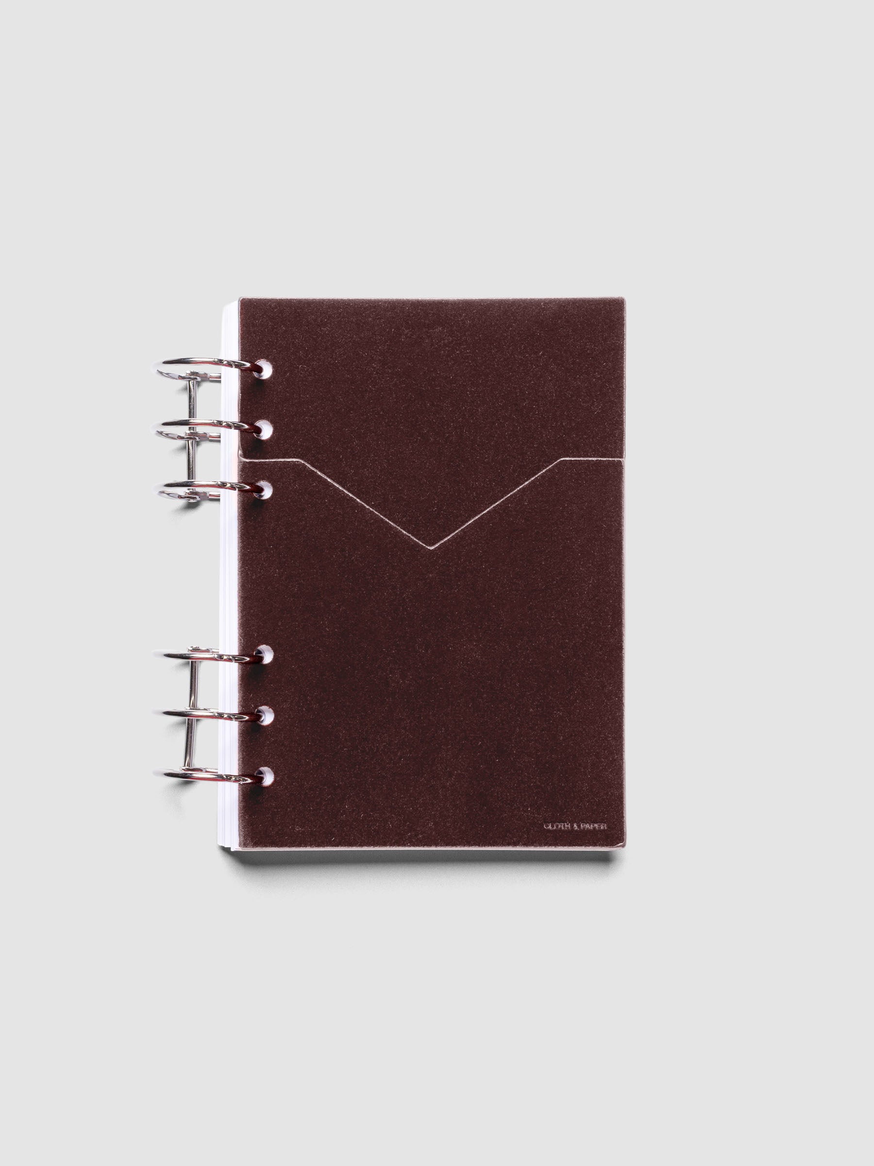 Velvet Pocket Folder in Bordeaux pre-punched for Personal Wide planners shown ringbound.