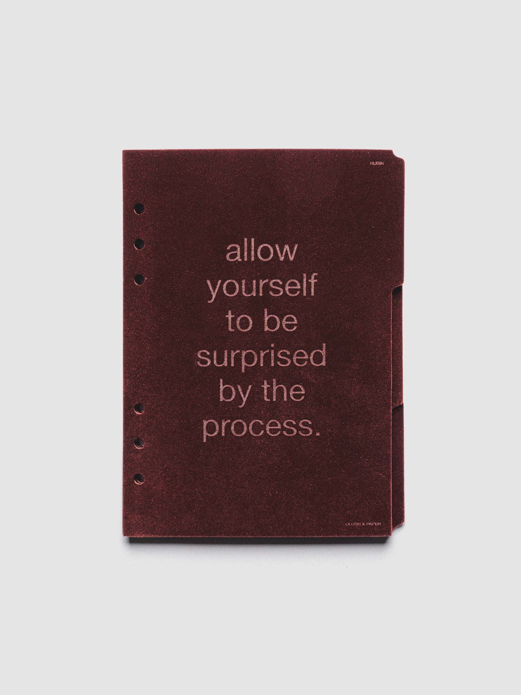 Three velvet side tab planners dividers in the color Bordeaux with text deboss designs shown in size A5.