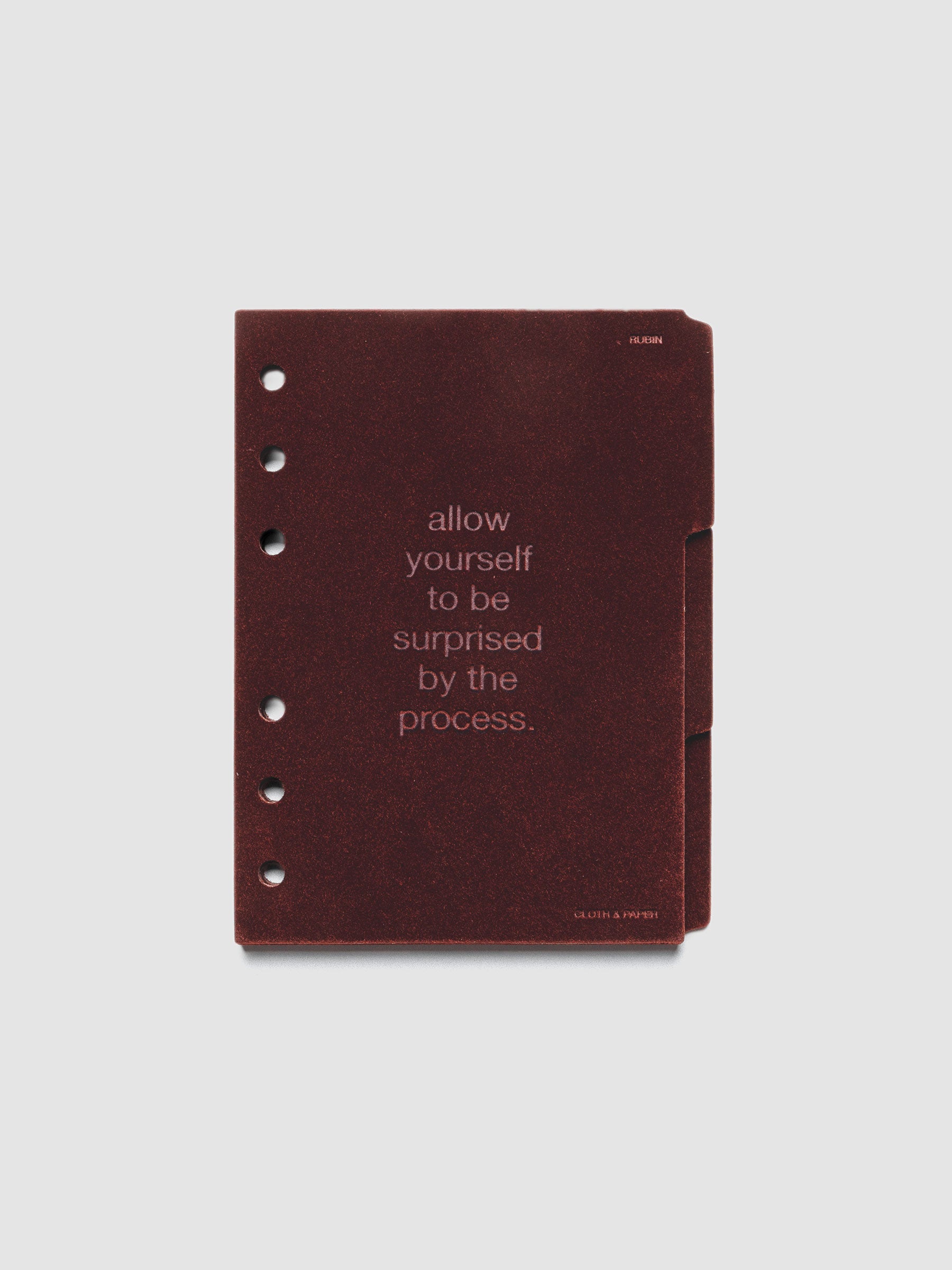 Three velvet side tab planners dividers in the color Bordeaux with text deboss designs shown in size A6.