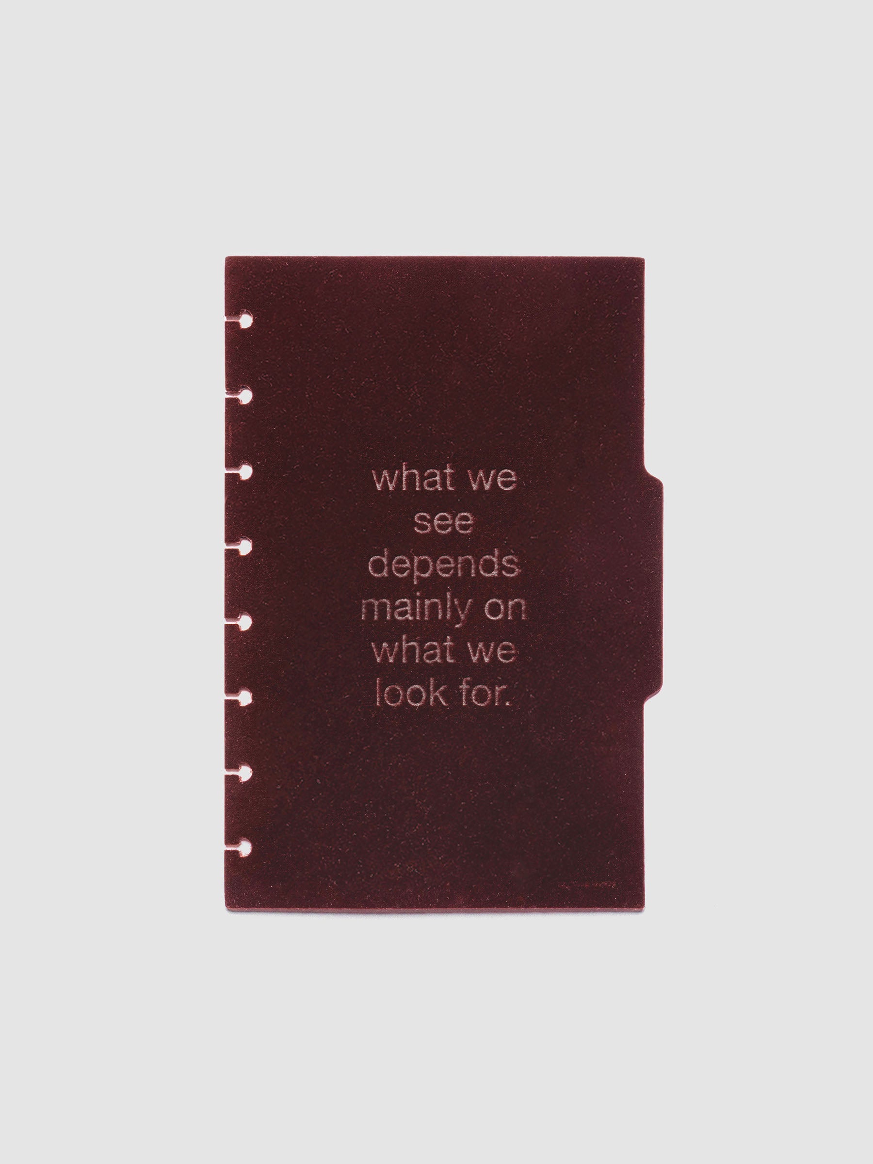 Second velvet side tab planners dividers in the color Bordeaux with text deboss design reading "what we see depends mainly on what we look for" in size Half Letter.
