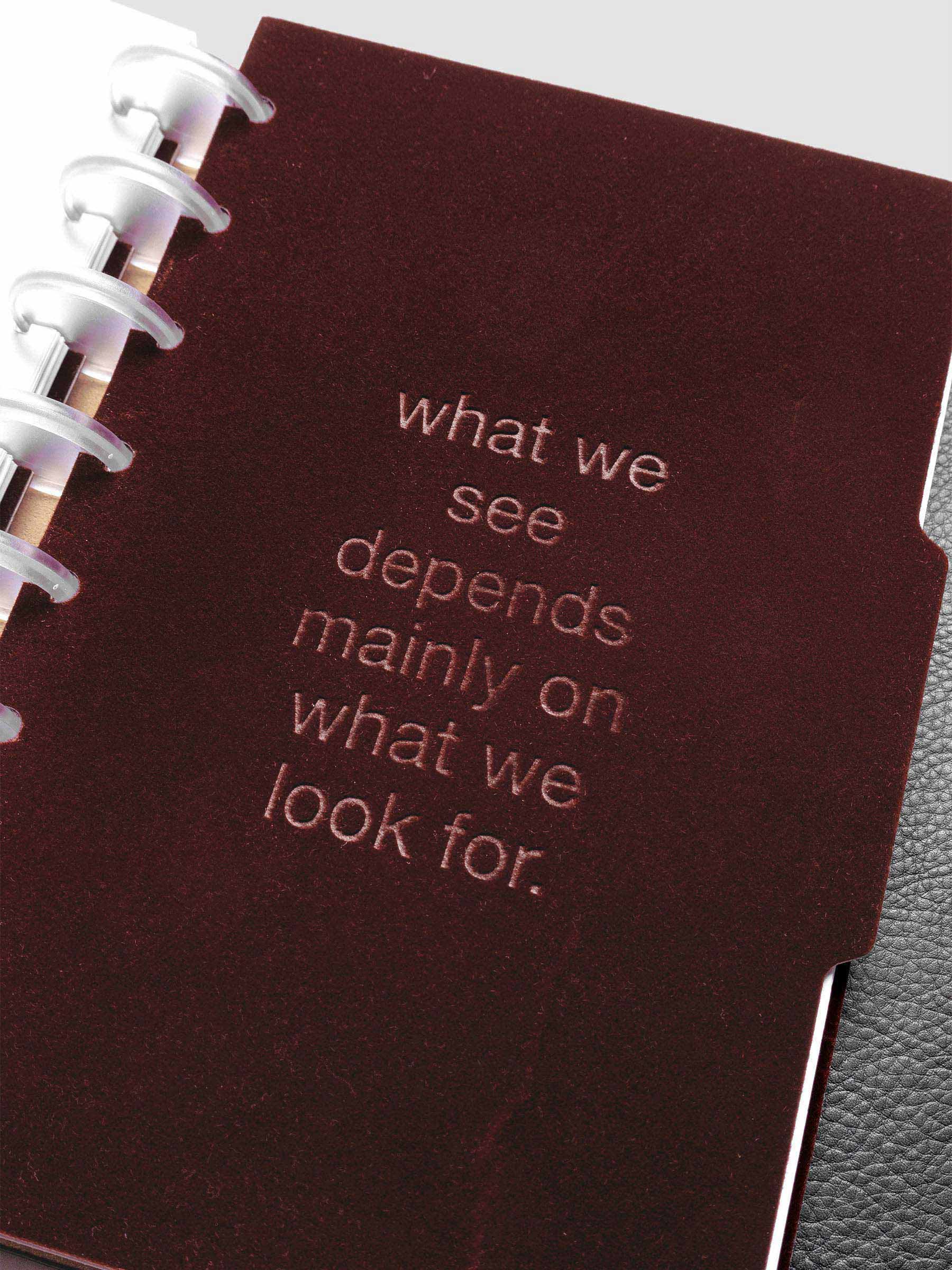 Close up image of the Velvet Side Tab Dividers in size Half Letter shown discbound.