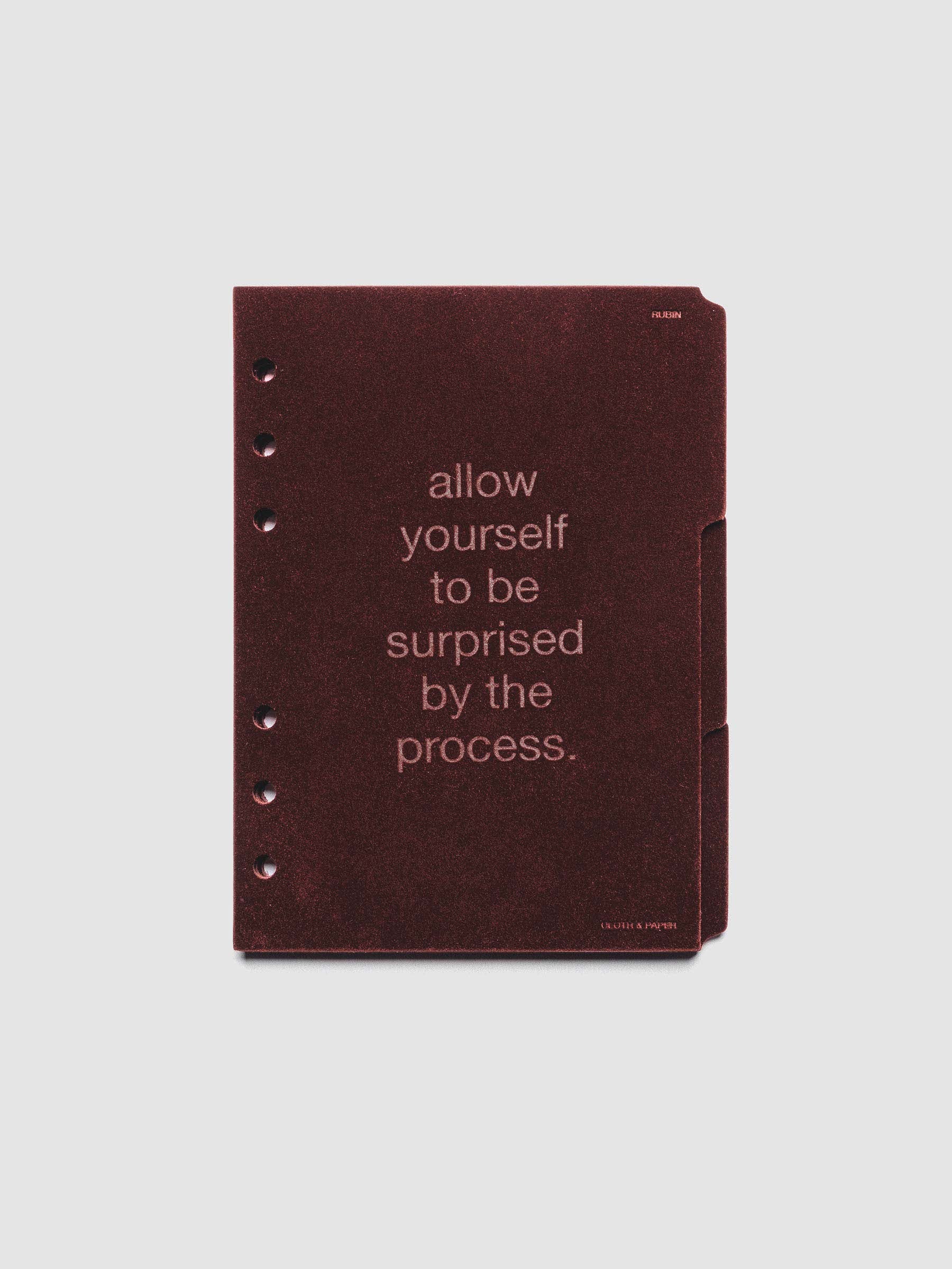 Three velvet side tab planners dividers in the color Bordeaux with text deboss designs shown in size Personal Wide.