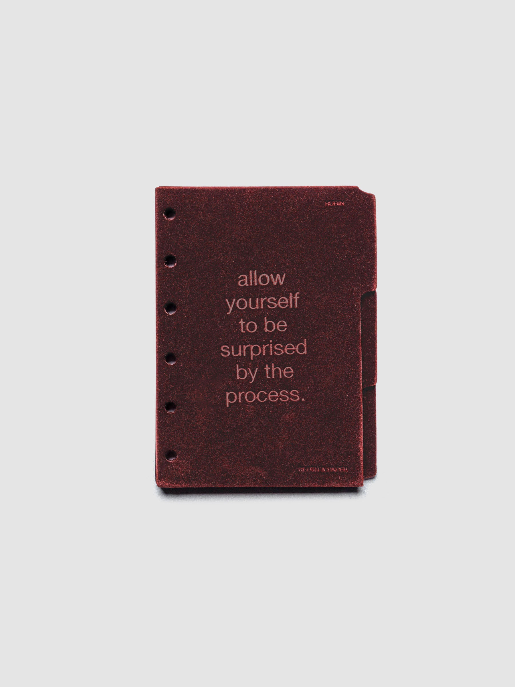 Three velvet side tab planners dividers in the color Bordeaux with text deboss designs shown in size Pocket.