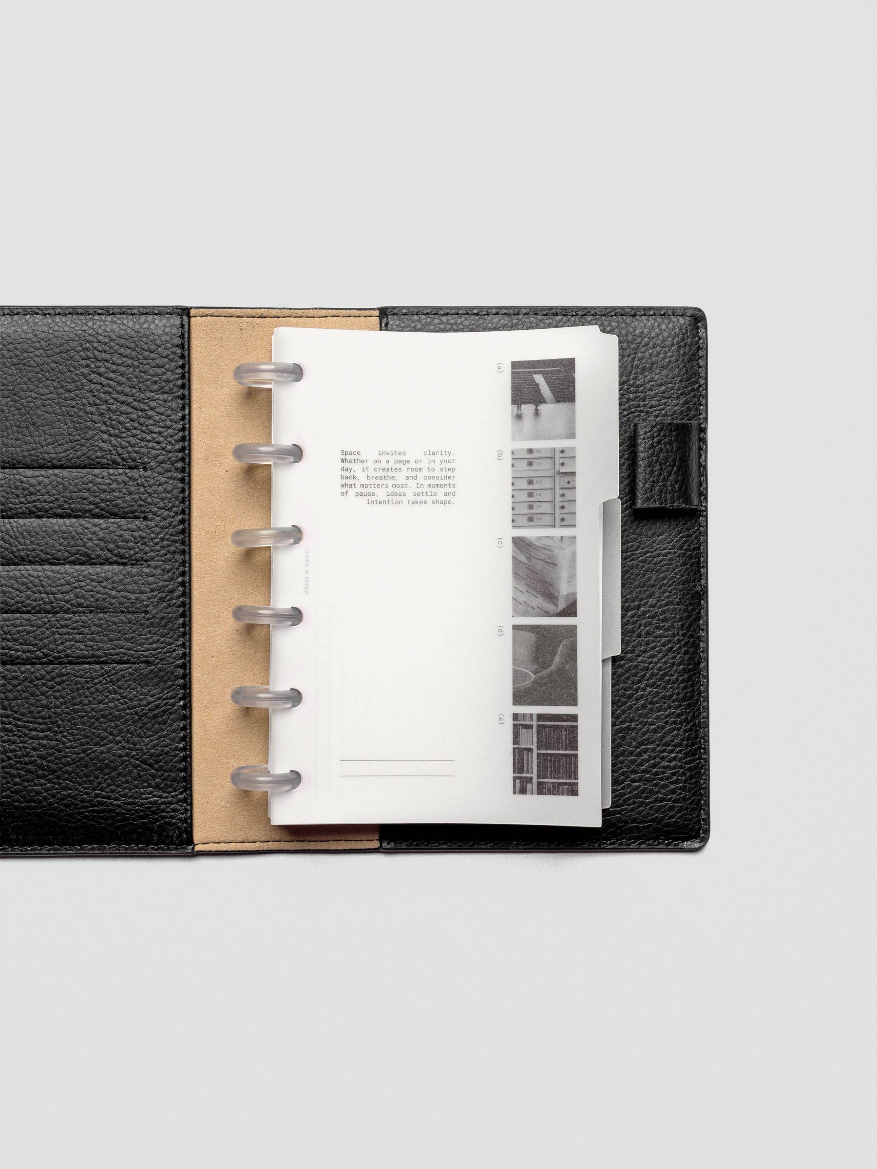 CP Petite Editorial Vellum Dividers Vol. 2 shown on a desk with planner inserts.