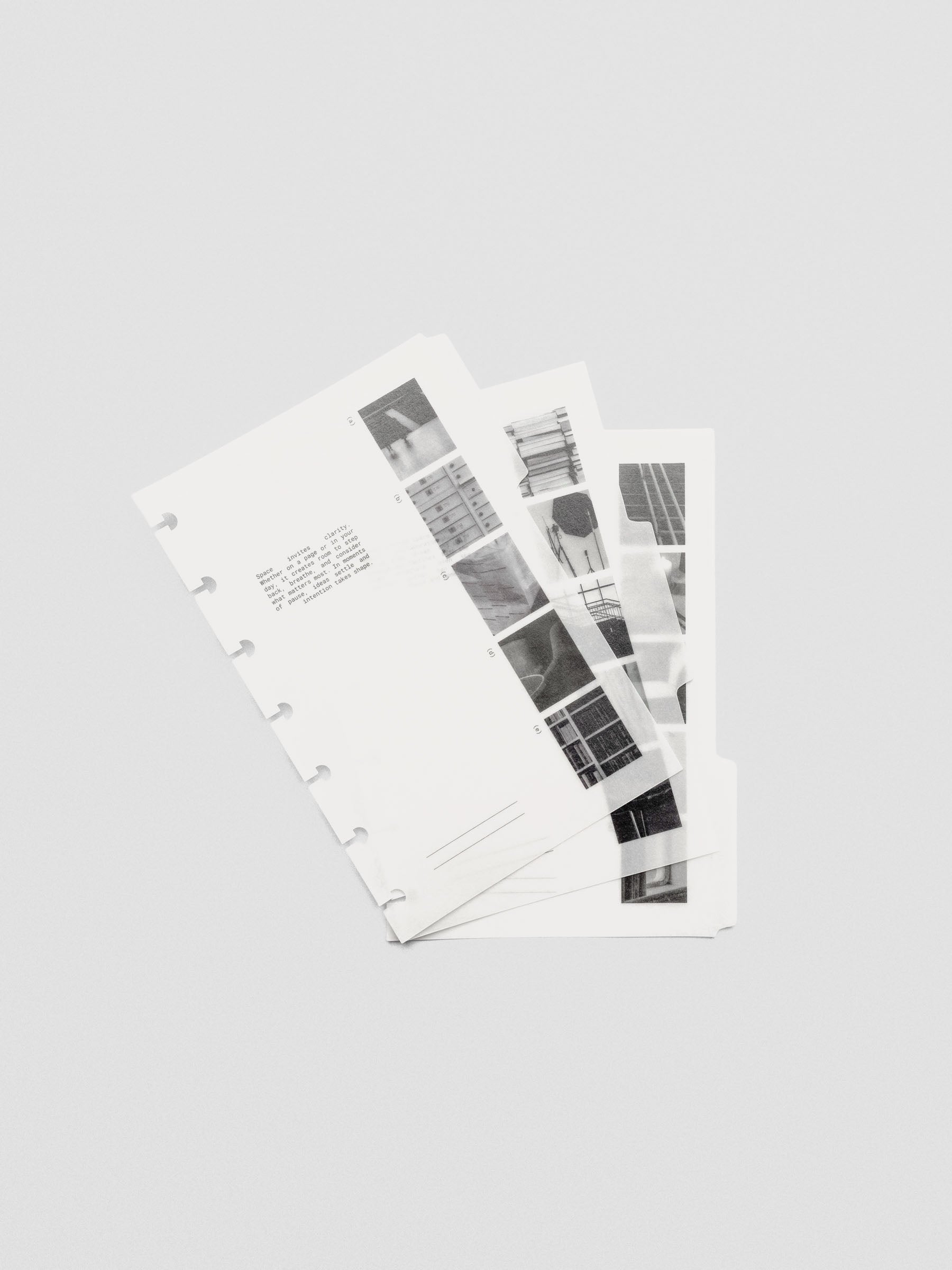 Stack of Editorial Vellum Dividers in HP Mini size, featuring translucent pages with bold editorial typography.
