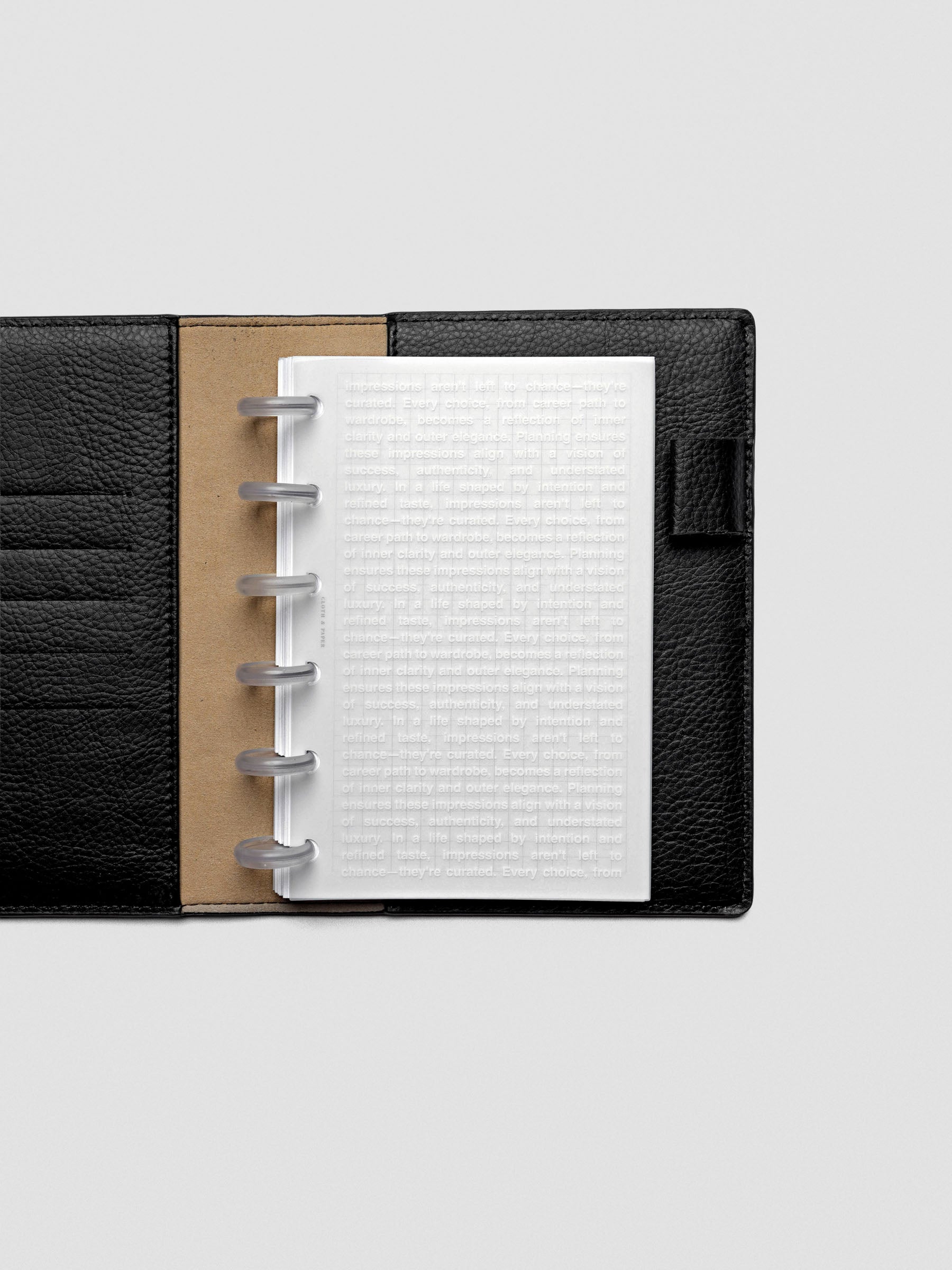 CP Petite Impressions Dashboard shown inside a planner with vellum layering effect.