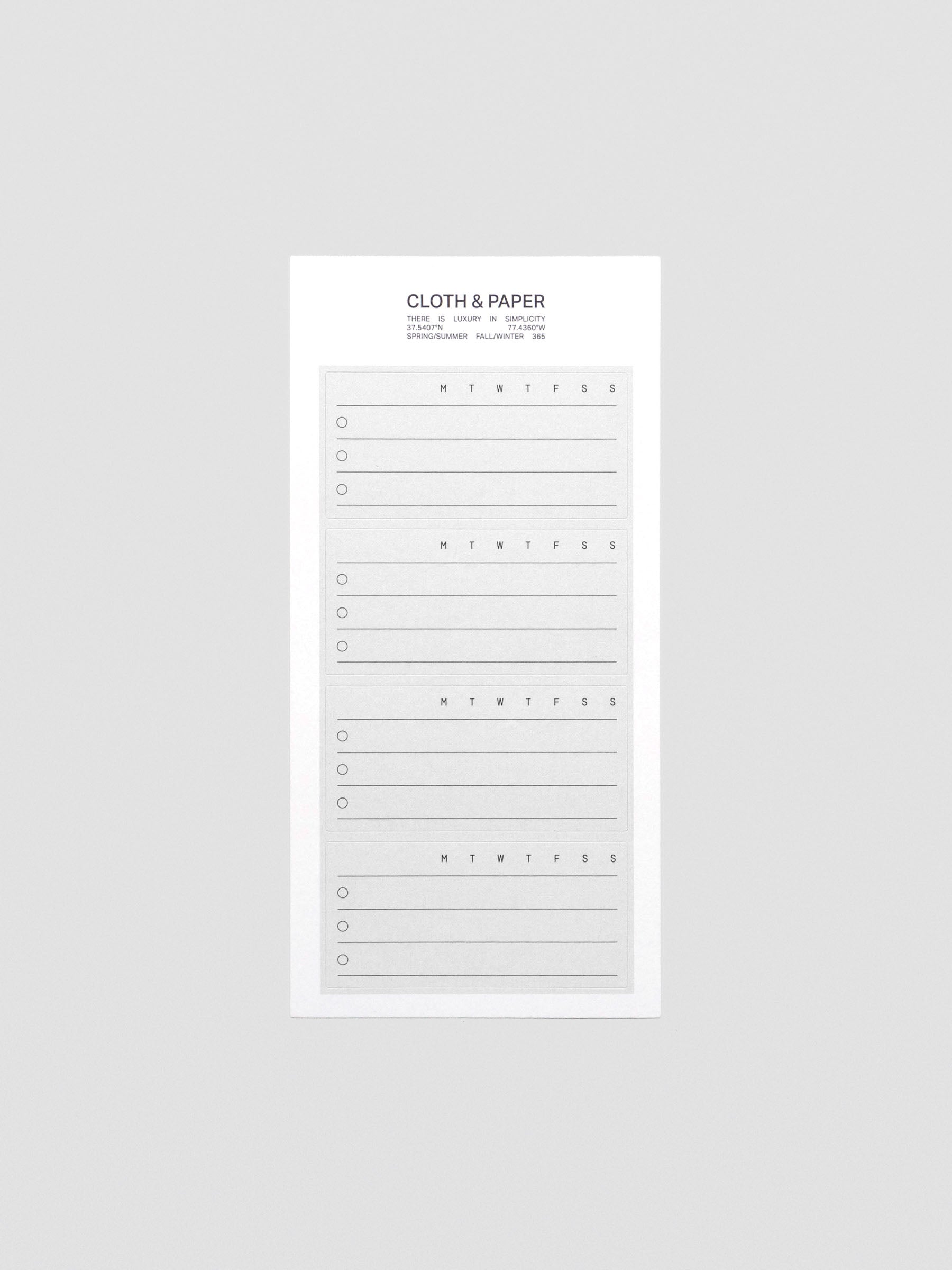 Close-up of black and grey Priority label stickers with bold text.