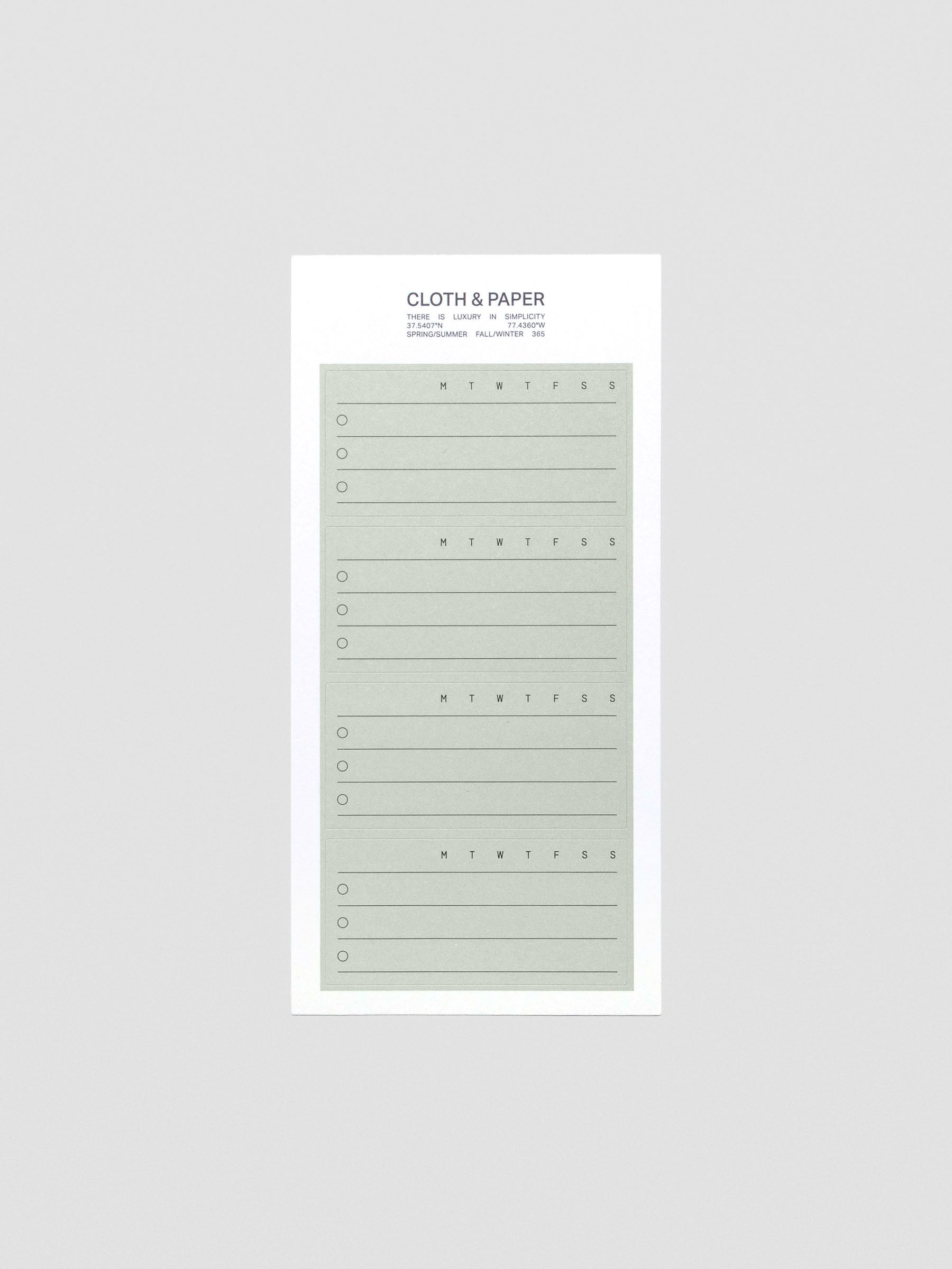 Flat lay of Priority label sticker sheets in black and matcha green.