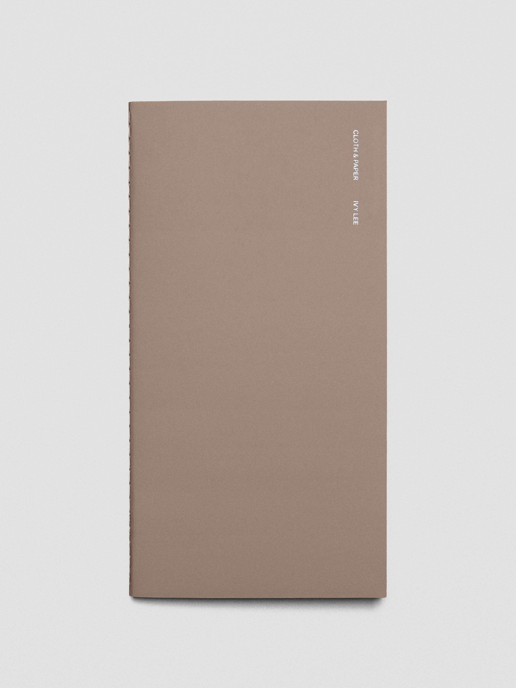 Cover of the Ivy Lee Method A5 Slim notebook placed flat on a surface.