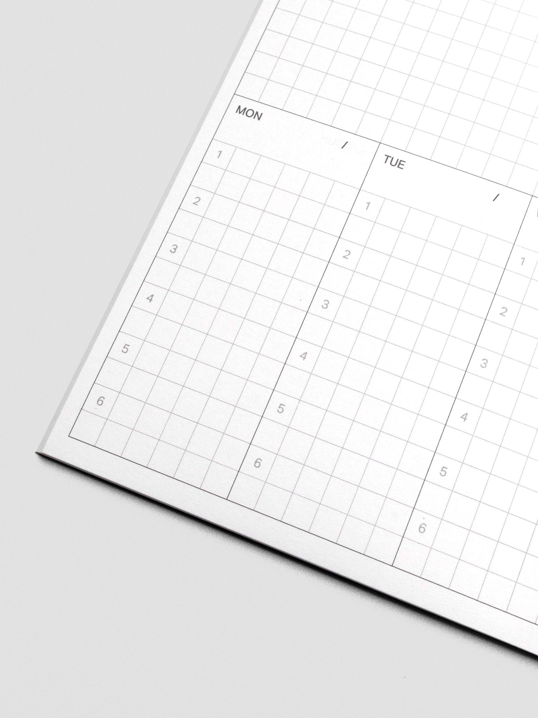 Multiple Ivy Lee Method notebooks arranged side by side.