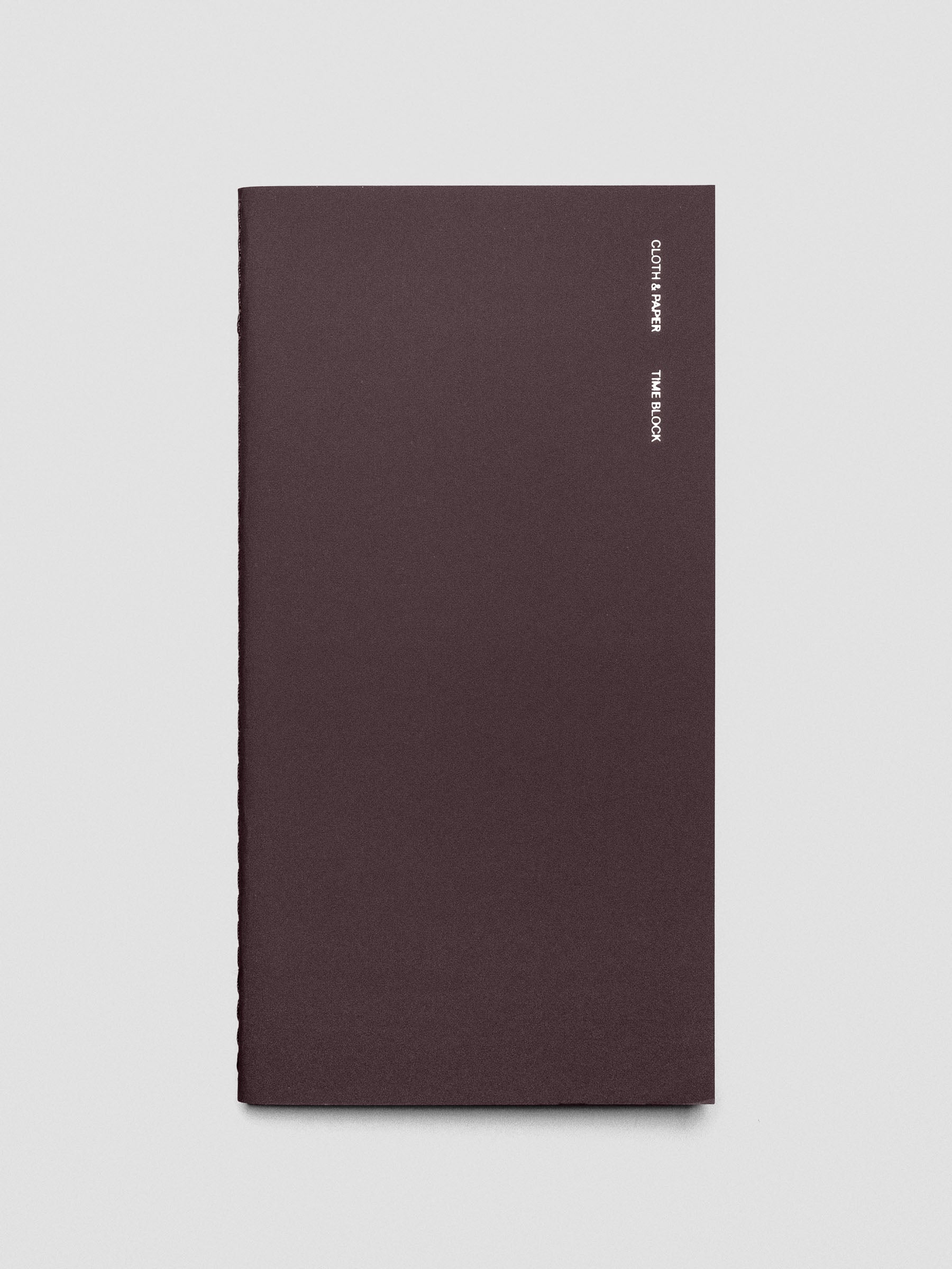 Cover of the Time Blocking A5 Slim notebook placed flat on a surface.