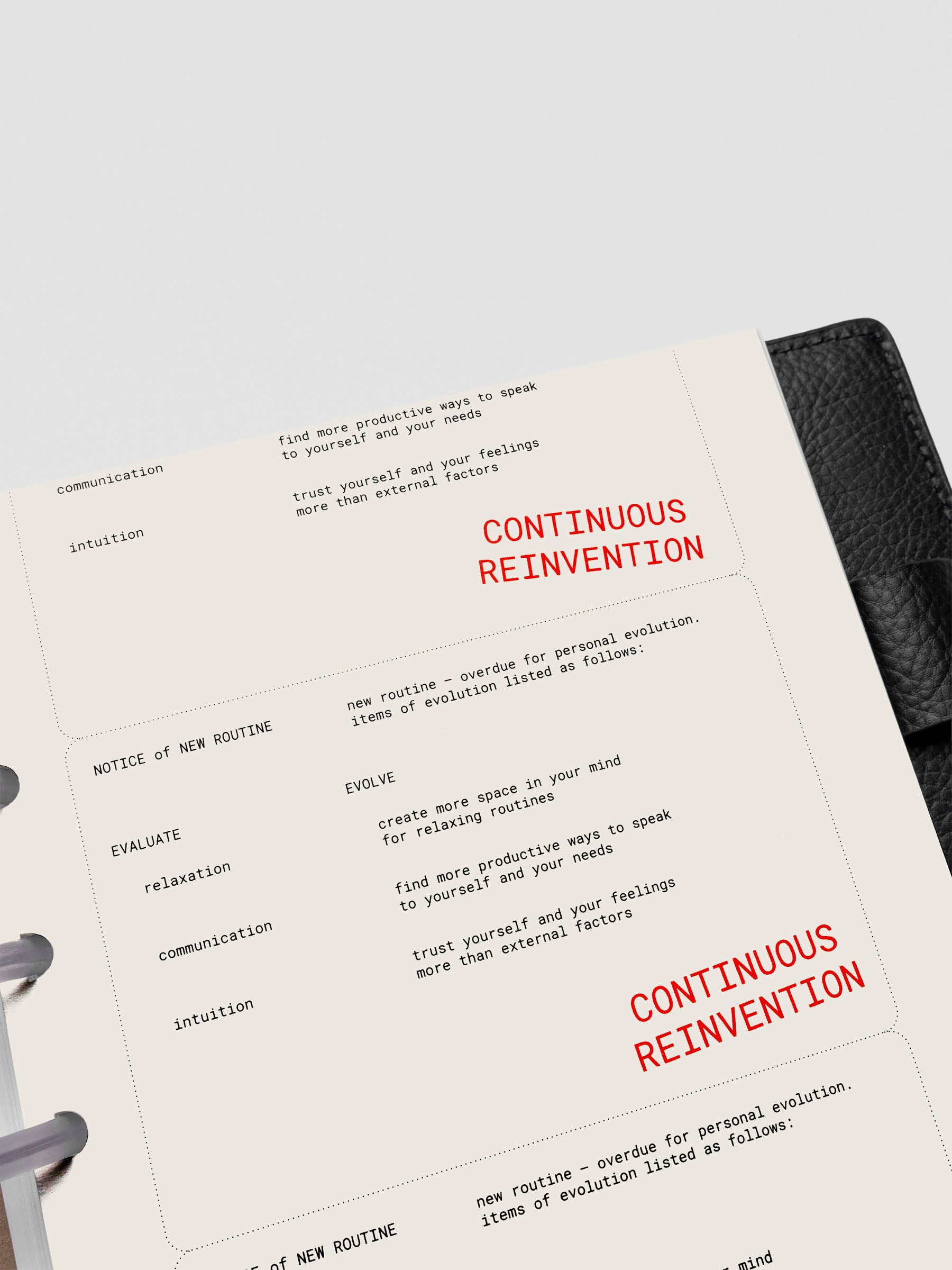 Half Letter Reinvention Dashboard angled view showing printed text detail.