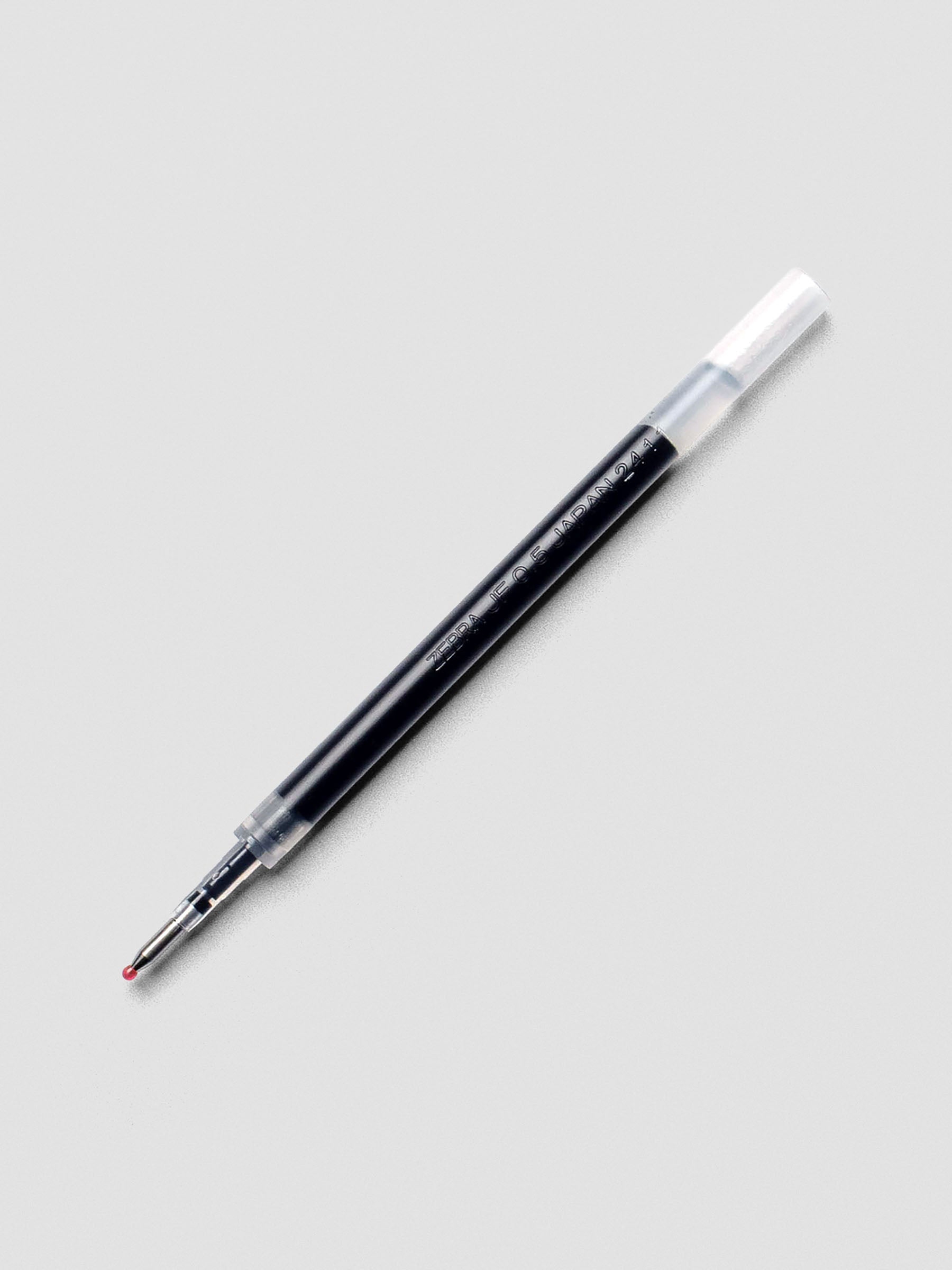 Zebra Sarasa 0.5 mm black gel pen refill on white background.