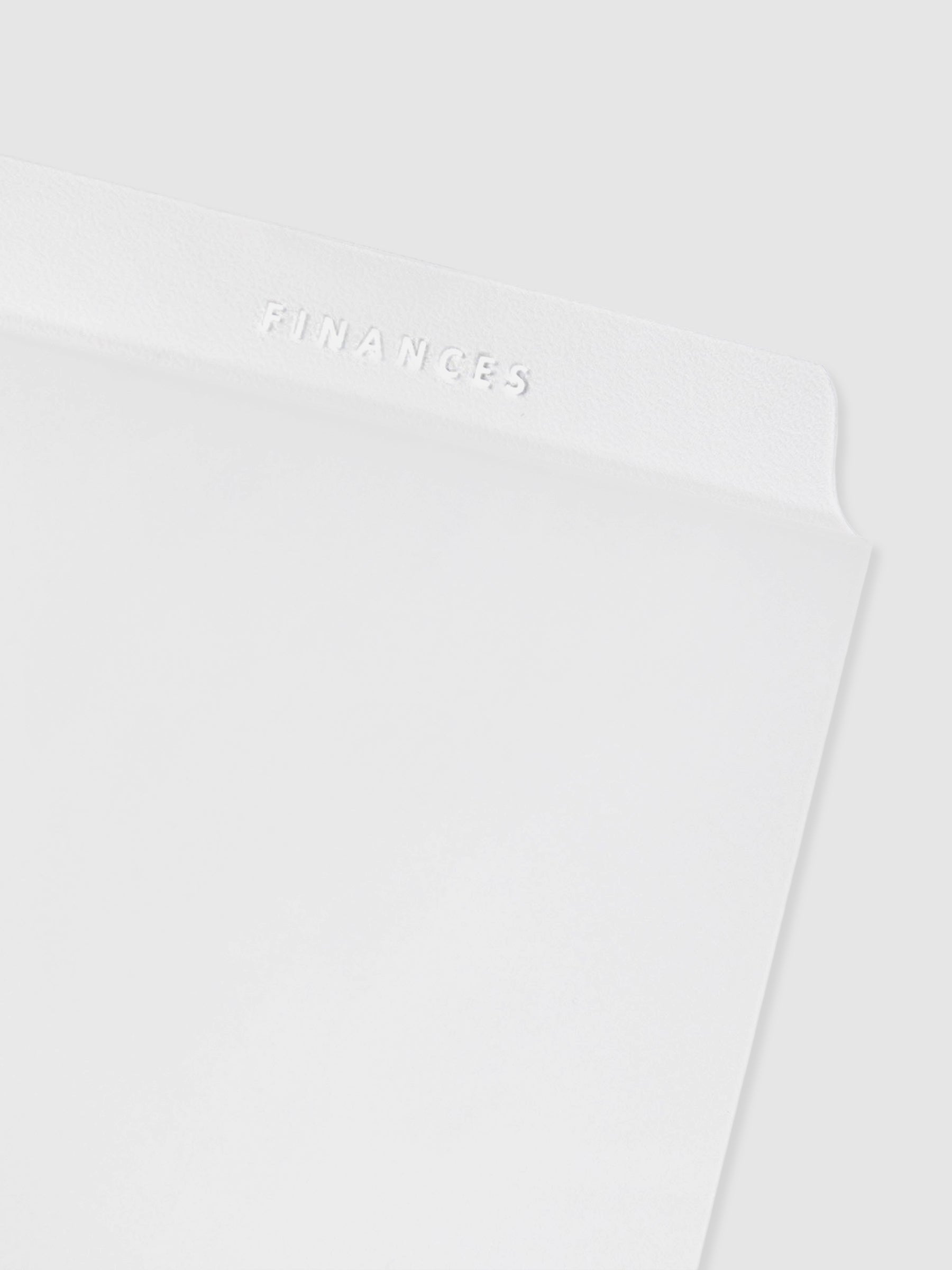 Closeup of the White Essentials Side Tab Planner Dividers Glass Plastic.