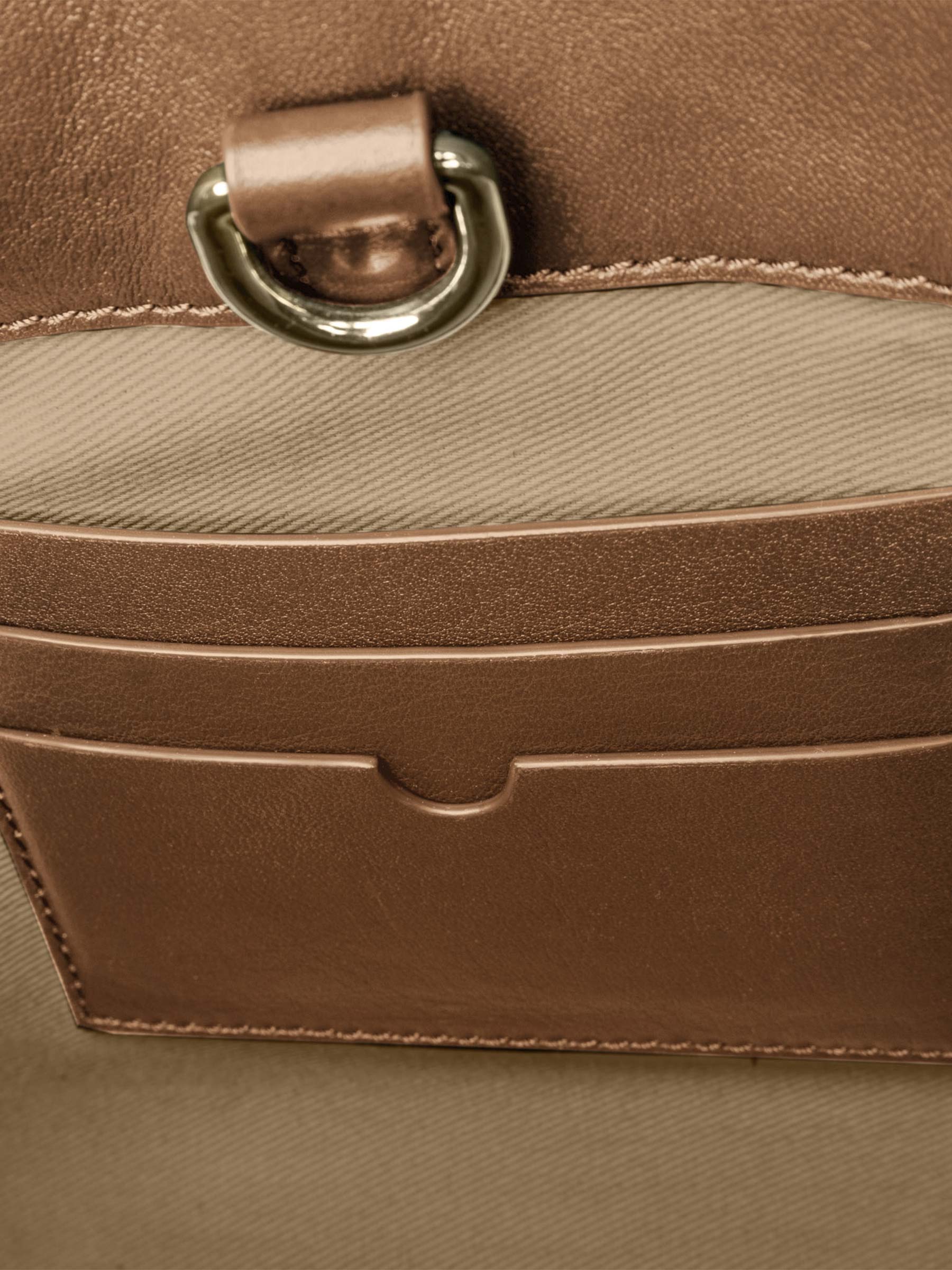 Closeup of credit card slots inside bag. Color shown is Alhambra.