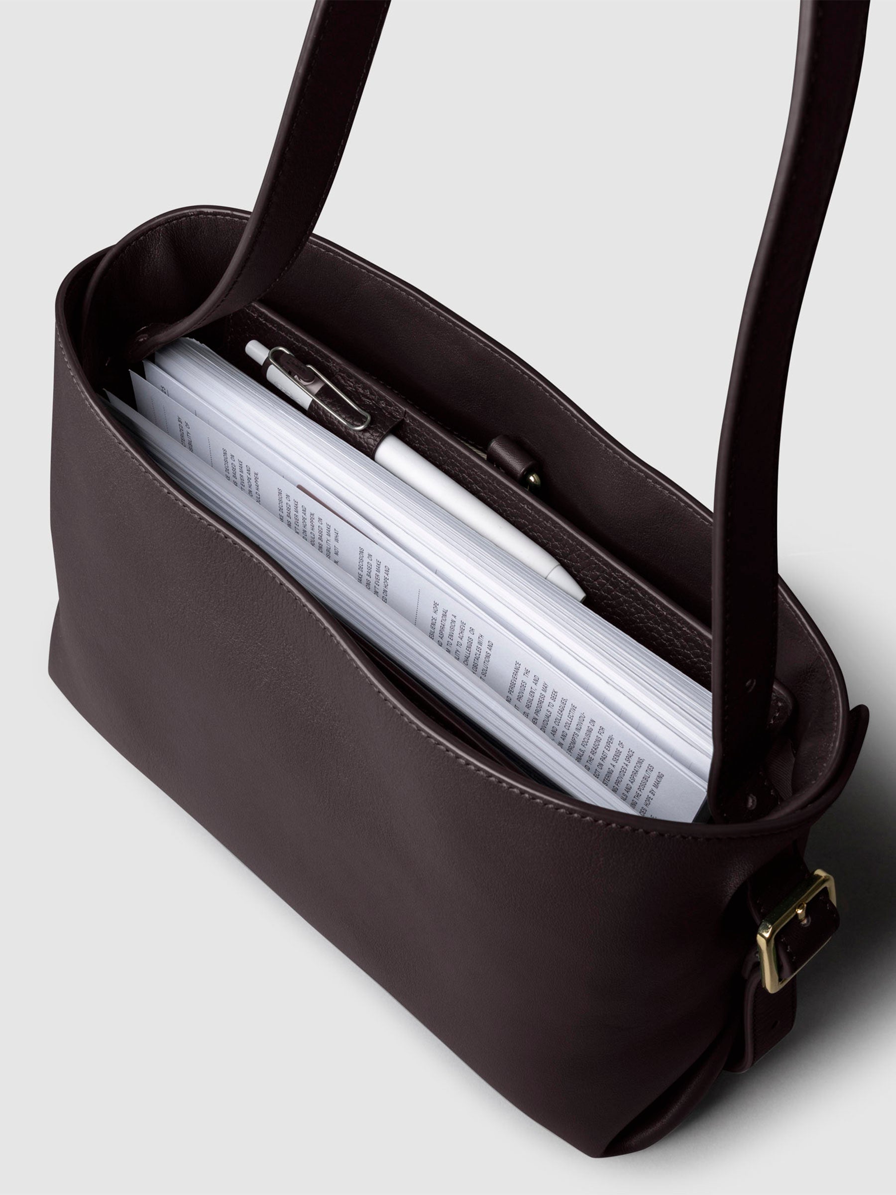 Bag shown from above with a planner inside of it. Color shown is Madrid.