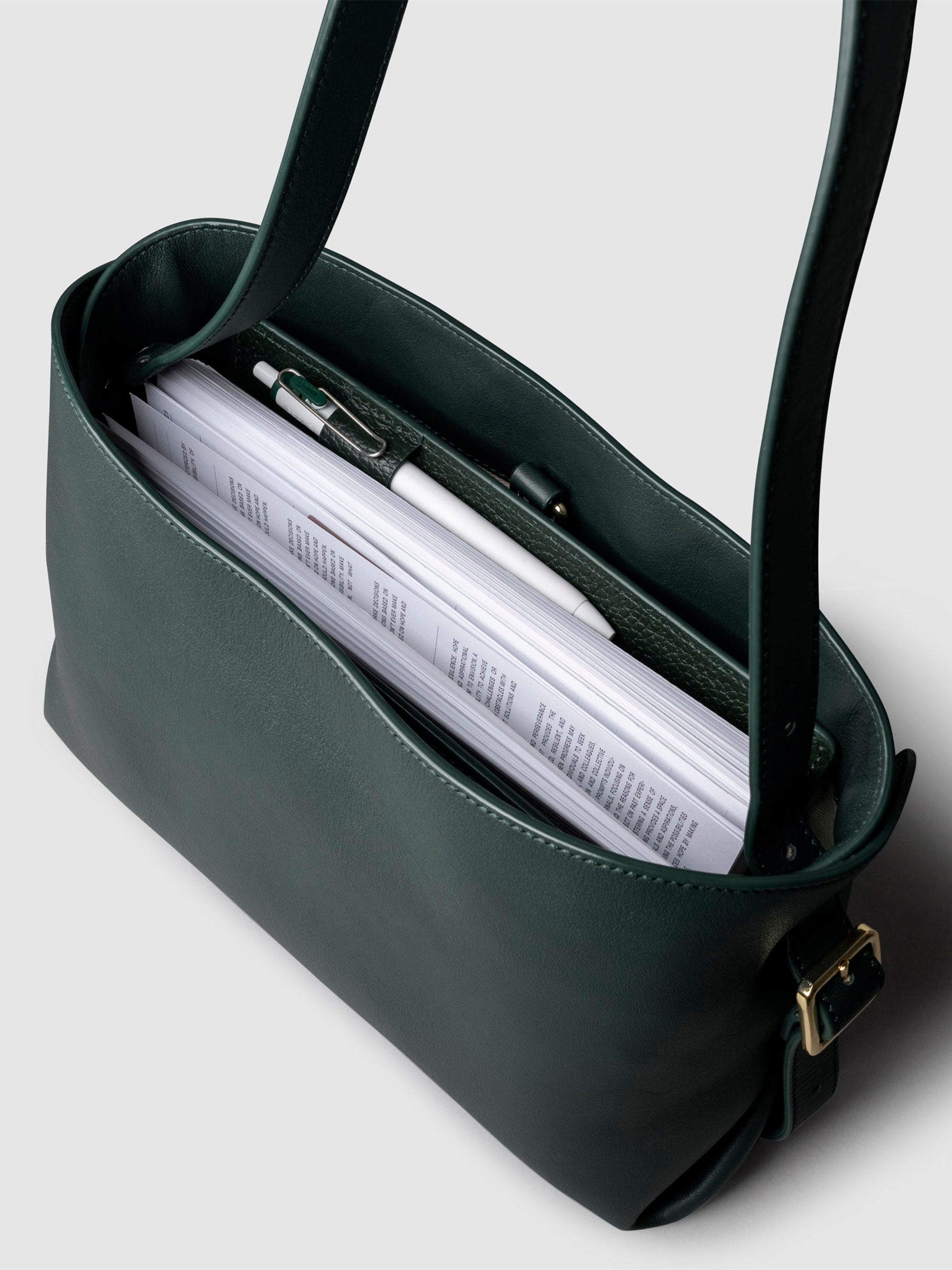 Bag shown from above with a planner inside of it. Color shown is Salamanca.