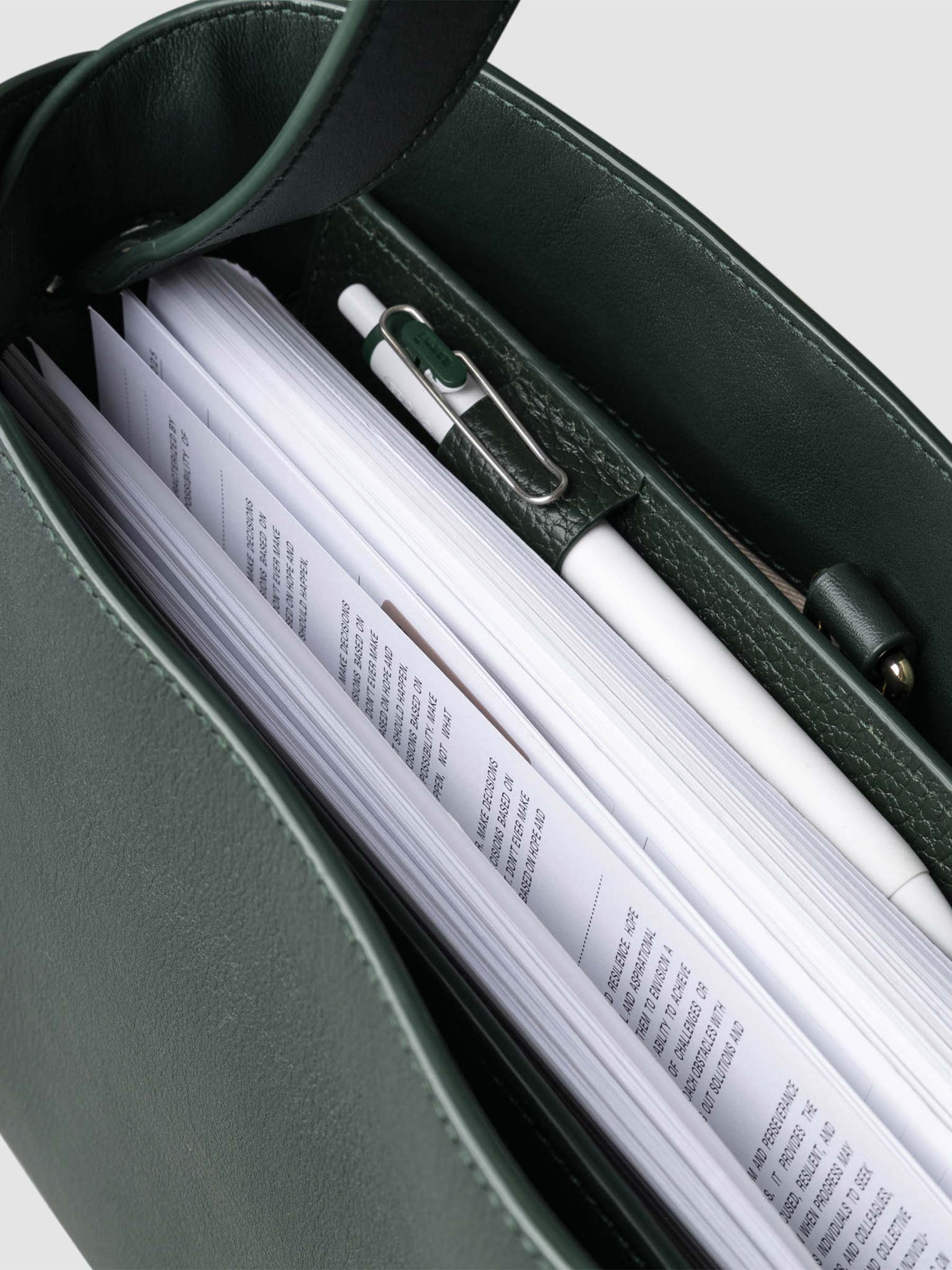 Bag shown from above with a planner inside of it. Color shown is Salamanca.