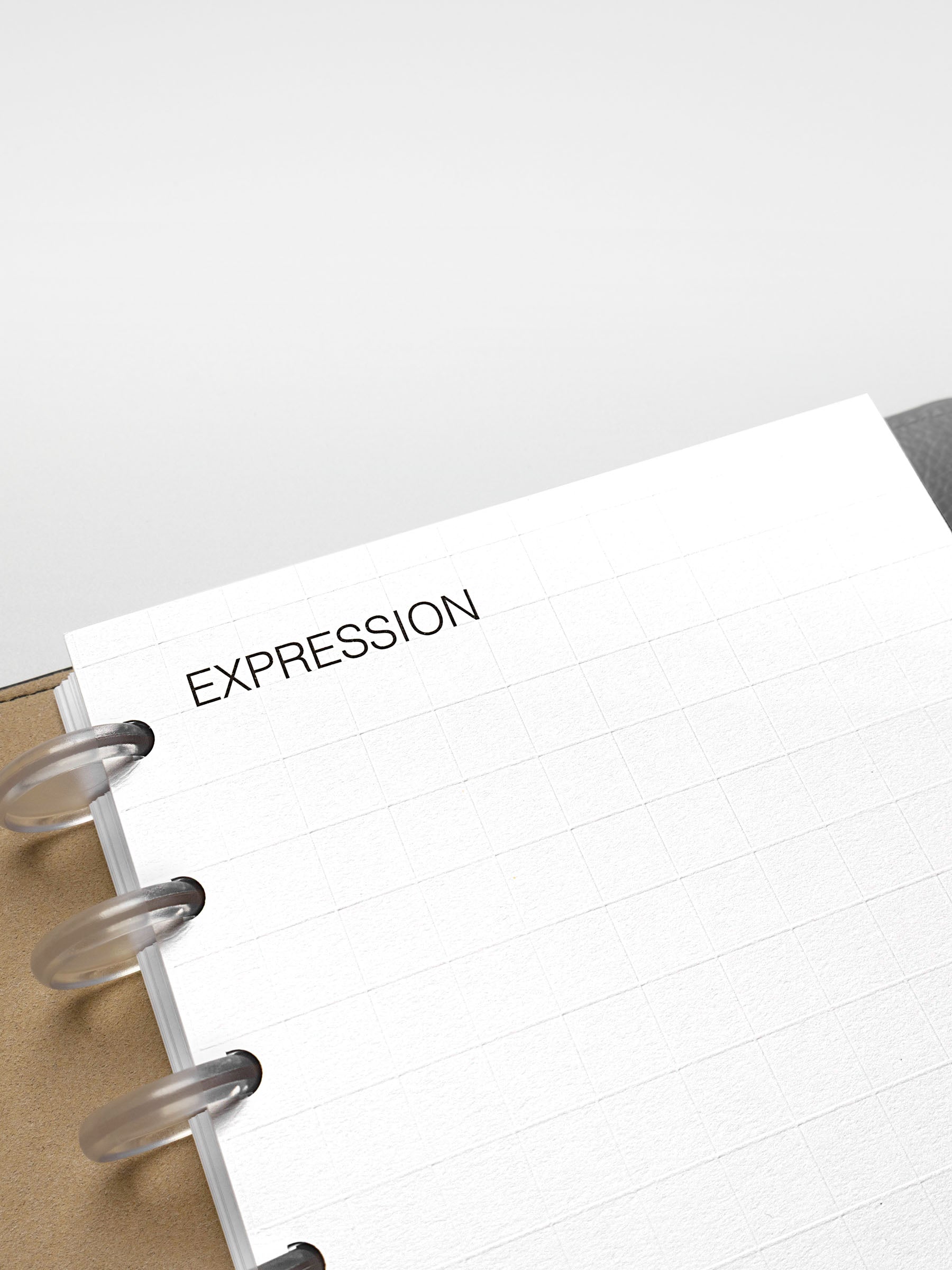 Angled view of the Half Letter Tile Planner Dashboard focusing on the header and grid details.
