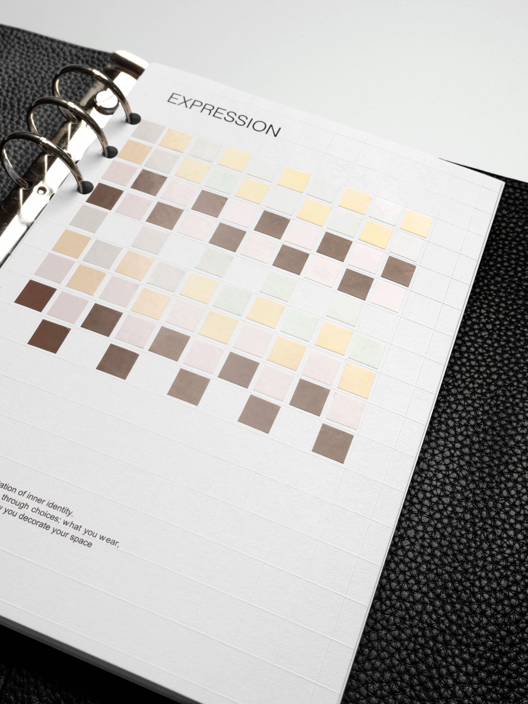 Close-up of the Tile Planner Dashboard in an A5 planner, adorned with Square Stickers in warm, earthy shades.