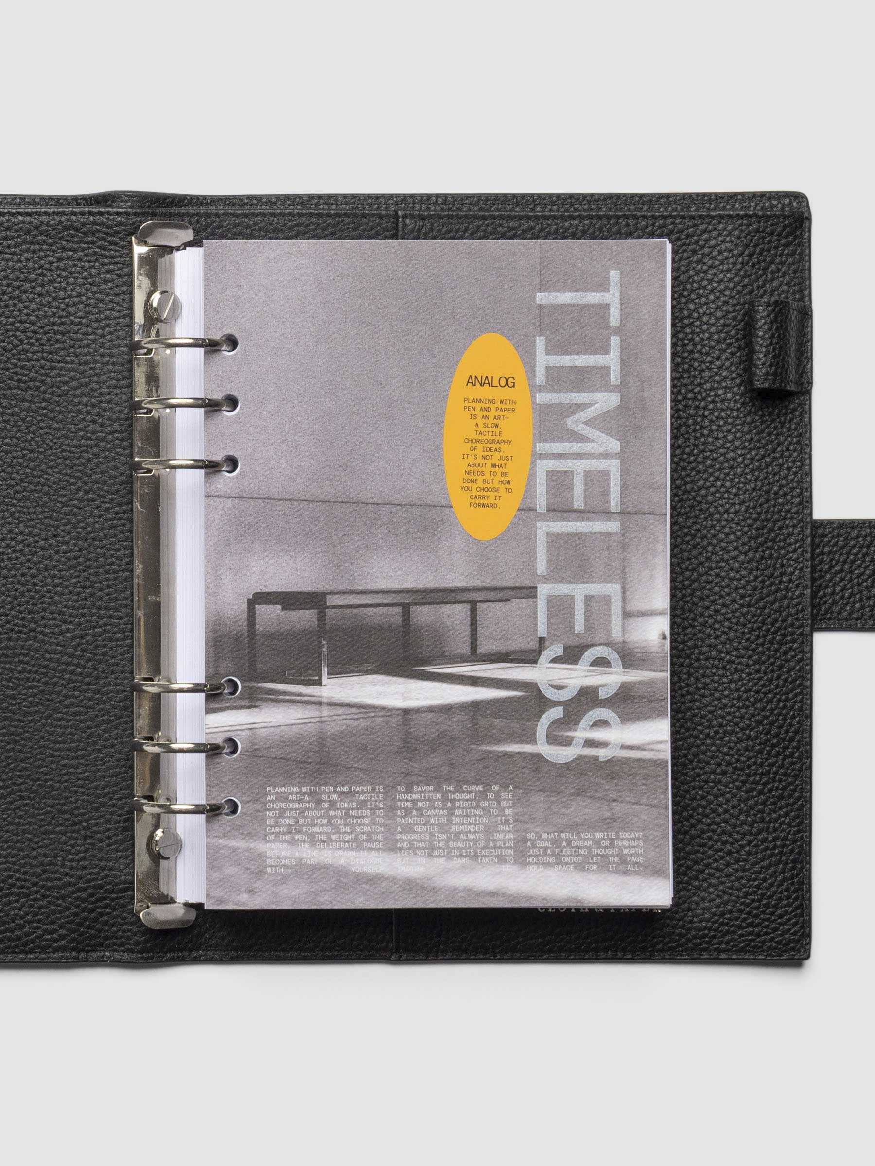 Dashboard in use inside a leather planner.