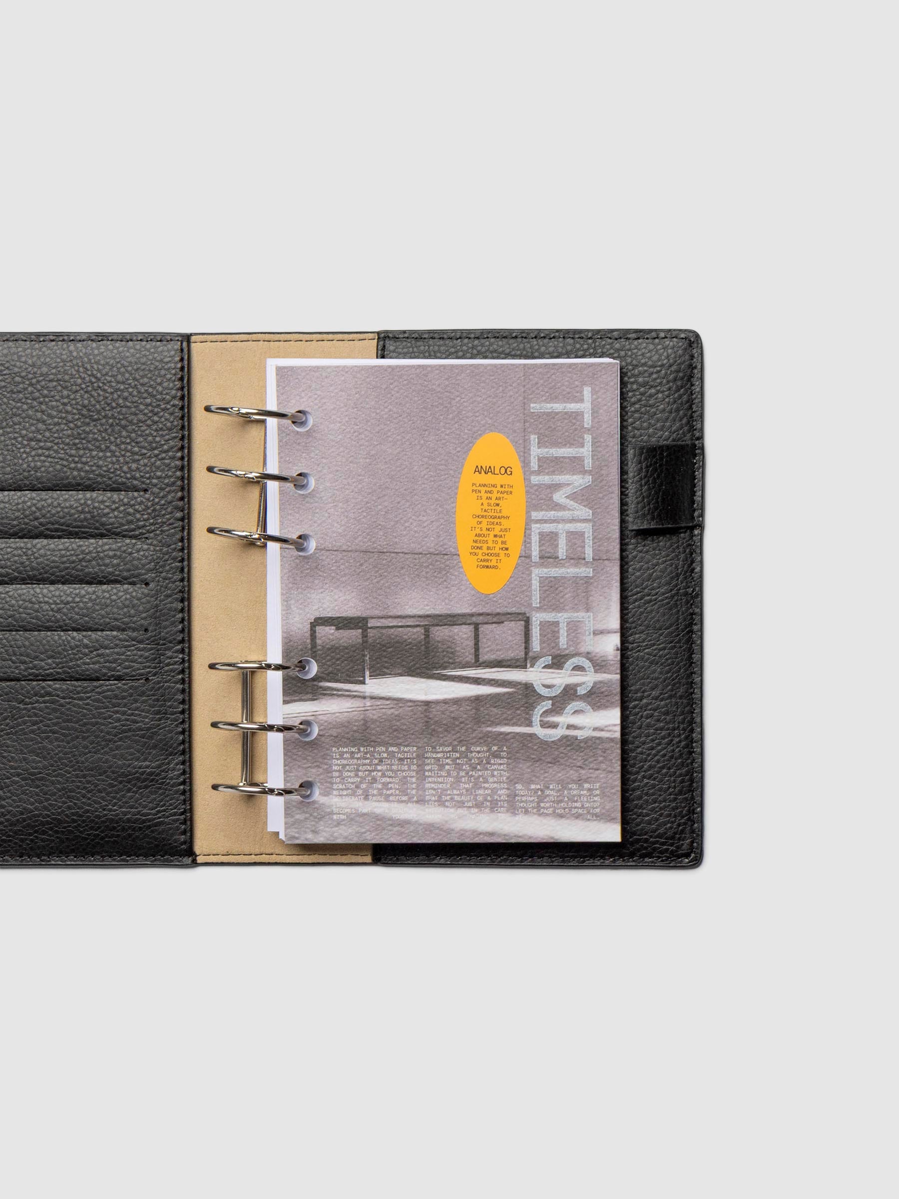 Dashboard in use inside a leather planner.