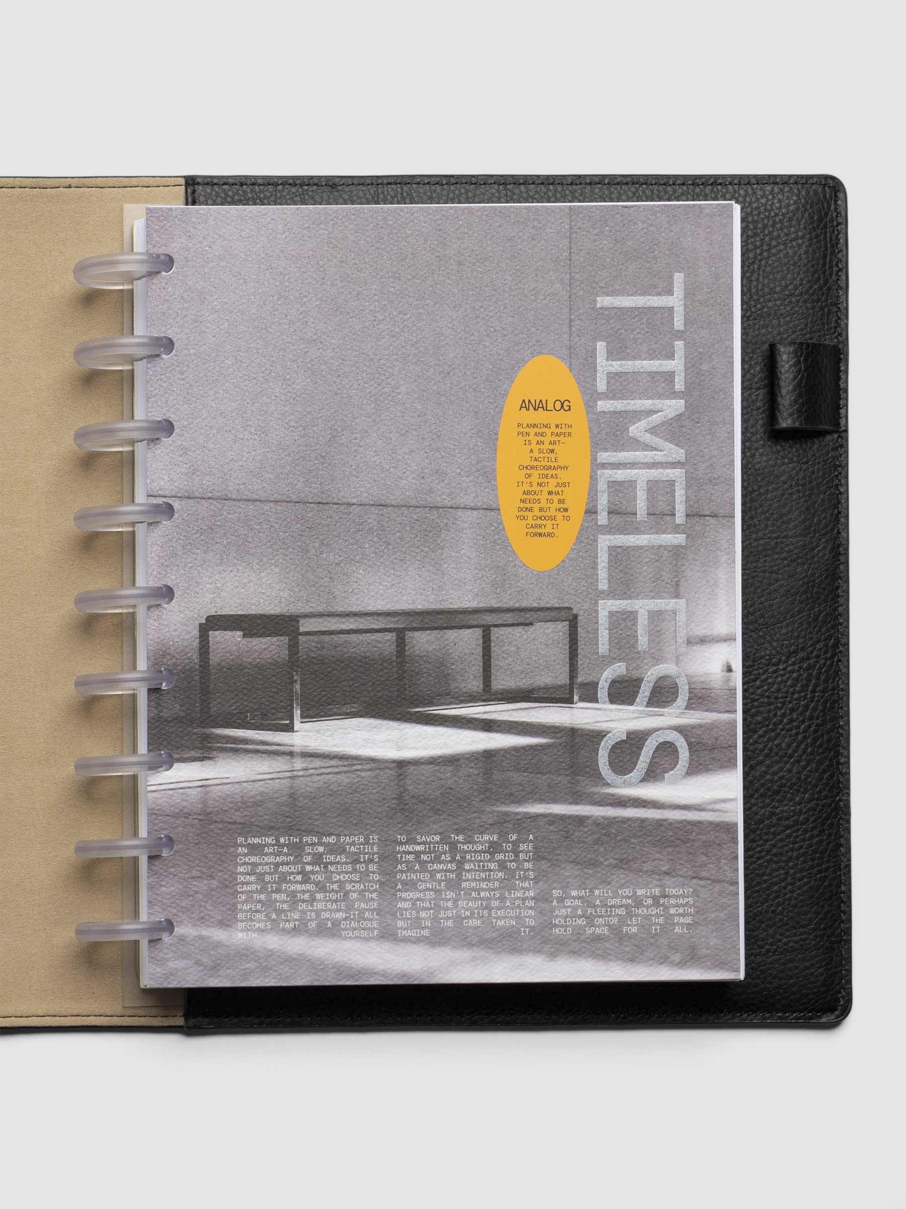 HP Classic dashboard displayed inside a leather planner on a neutral background.