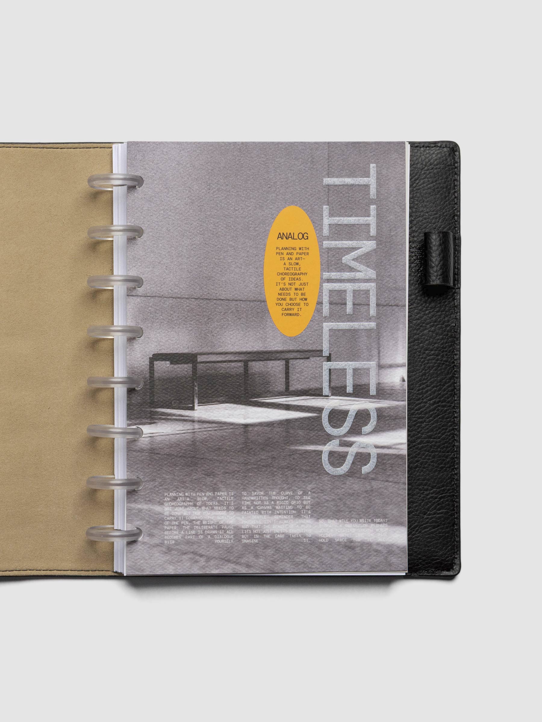 Half Letter dashboard displayed in a leather agenda on a neutral background.