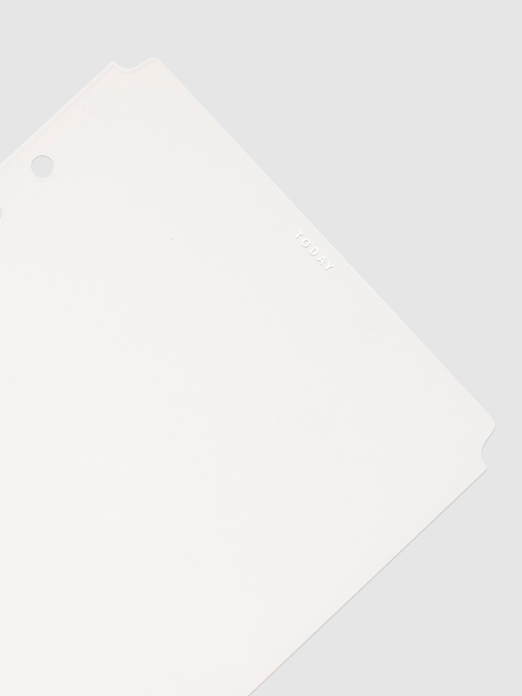 Today Dry Erase Tab Divider, White Text, Cloth and Paper. Close up on divider turned to the right against a neutral background.