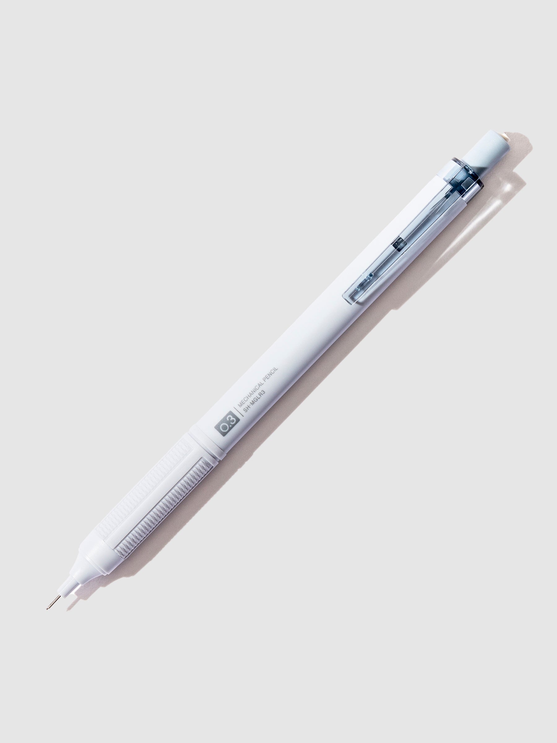 Greyish blue pencil displayed on a neutral background.