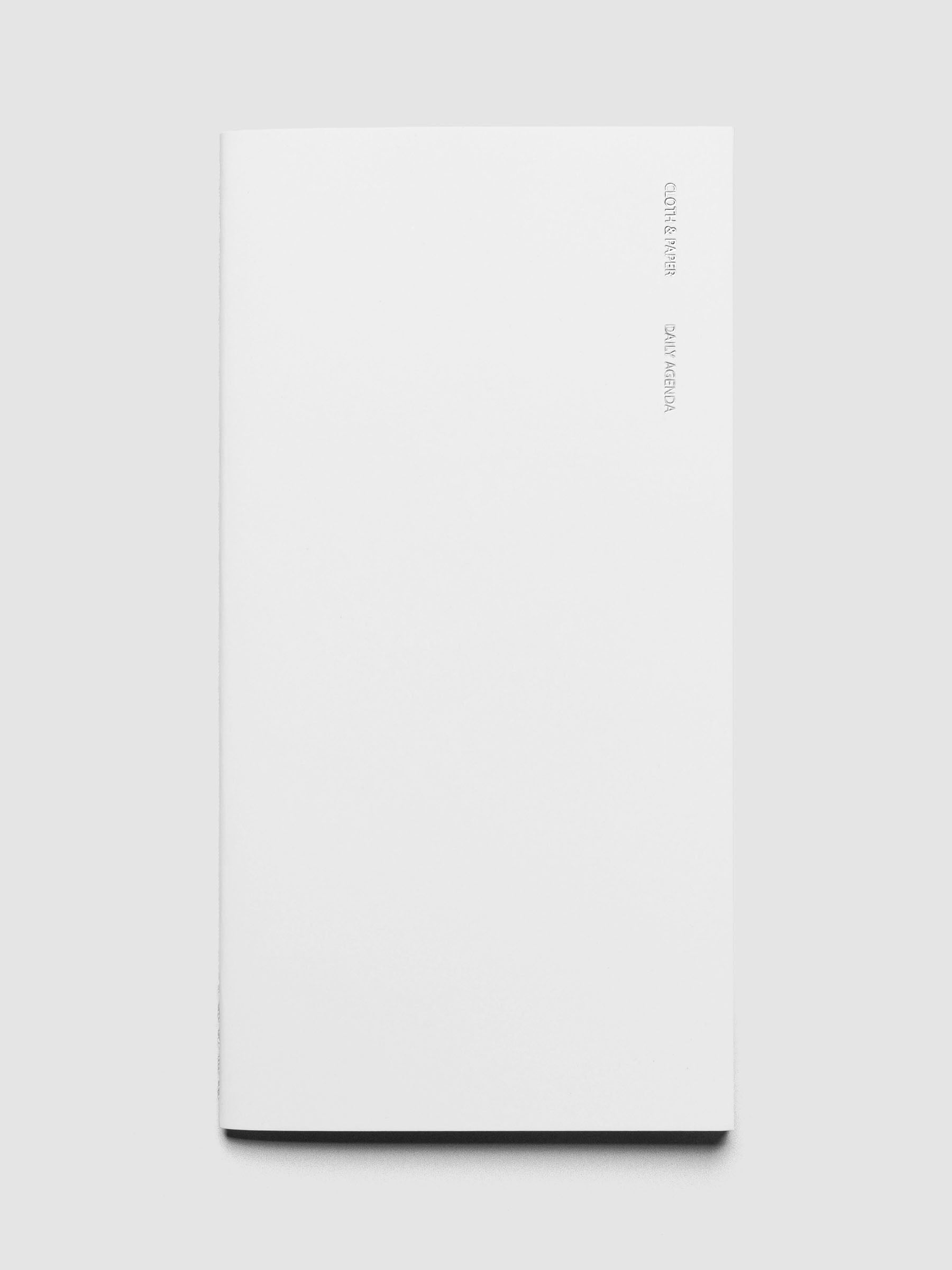 Travel Notebook | A5 Slim | Aspen | Daily Agenda shown closed on a neutral background.