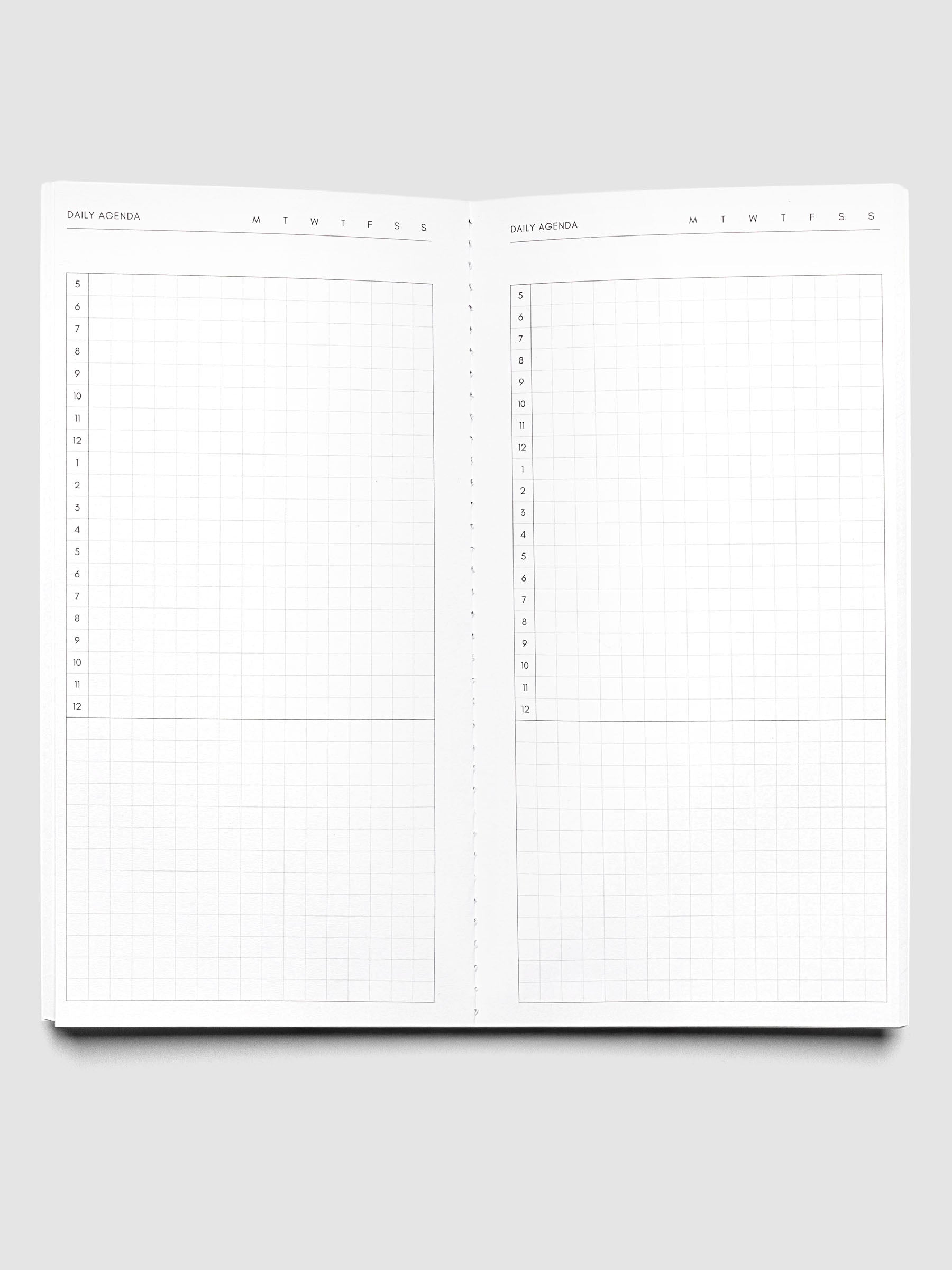 Travel Notebook | A5 Slim | Aspen | Daily Agenda shown open with daily agenda layouts on both side with space for scheduling and labeling the day of the week.