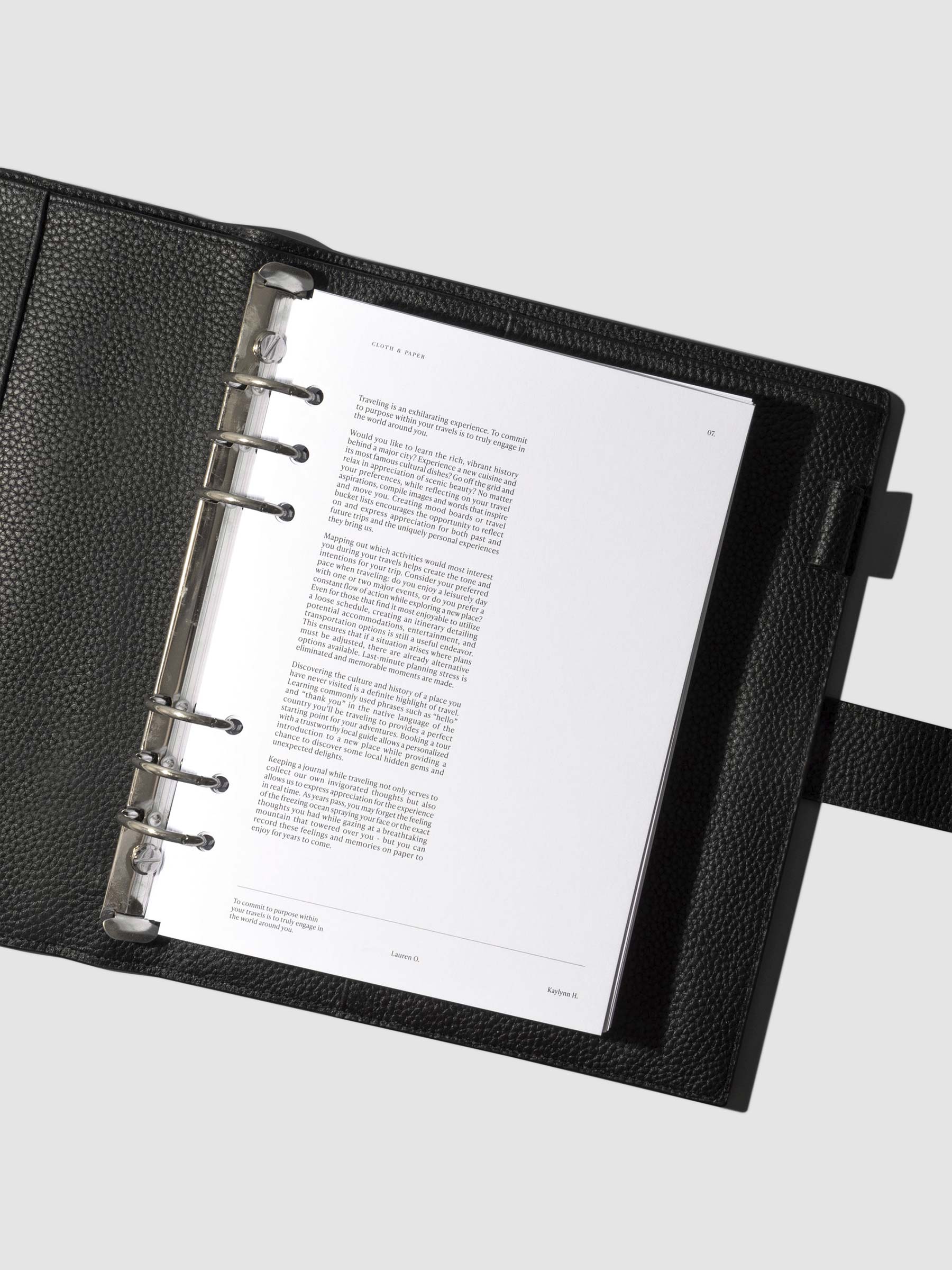 Dashboard shown in use inside a black leather agenda.