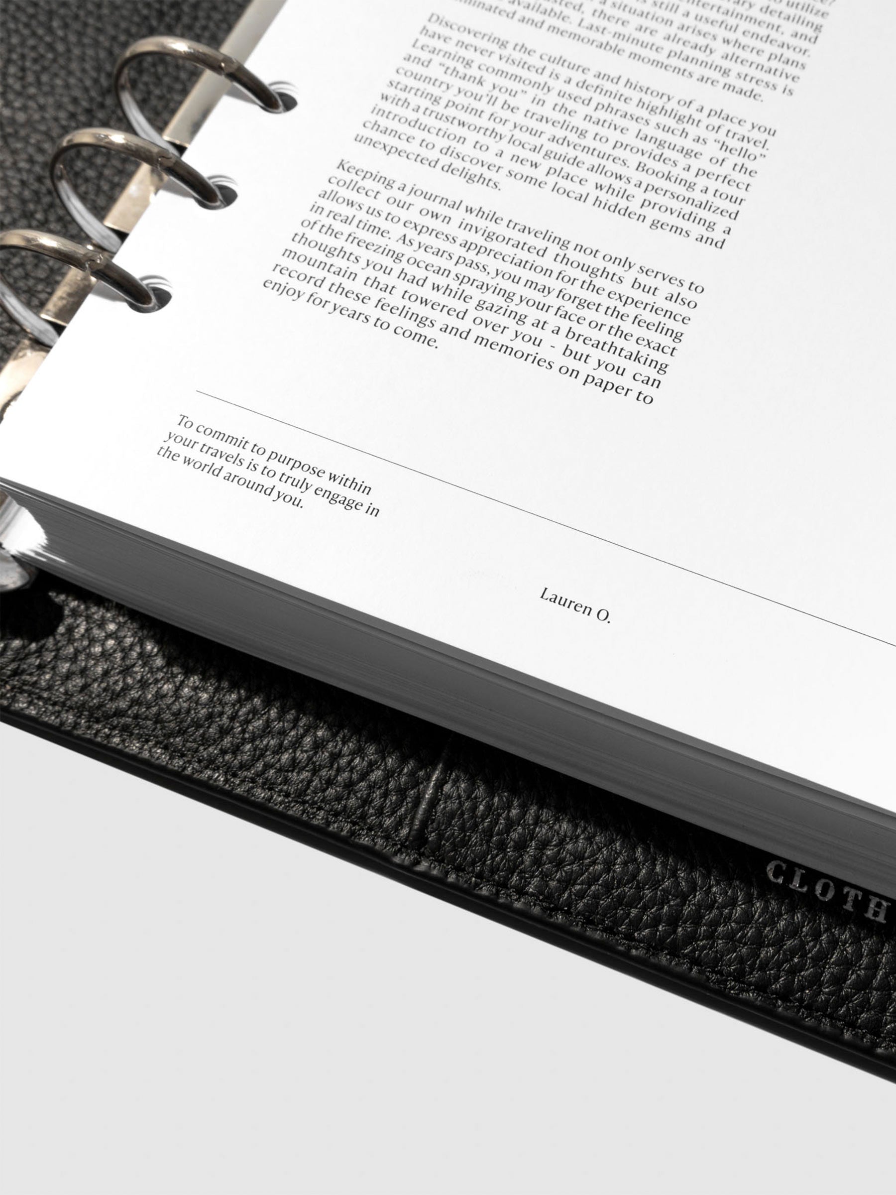 Dashboard shown in use inside a black leather agenda.