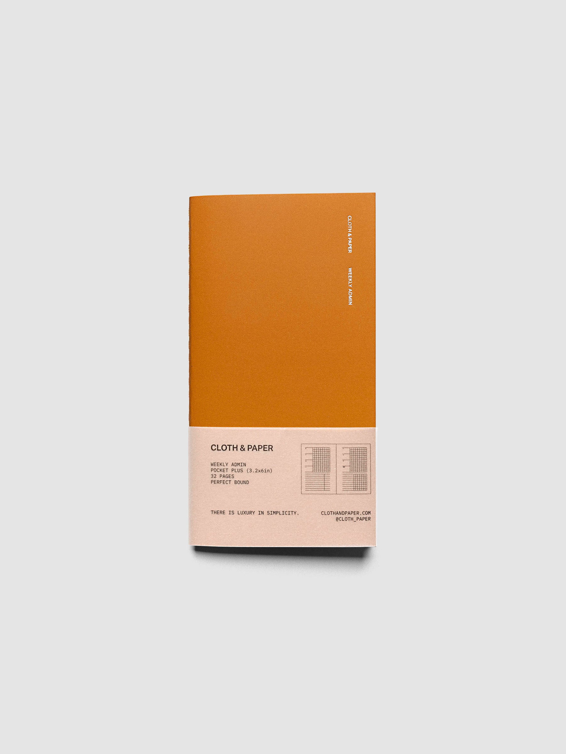Overview image of the Weekly Admin Pocket Plus travel notebook with silver foil cover text, displayed on a neutral background