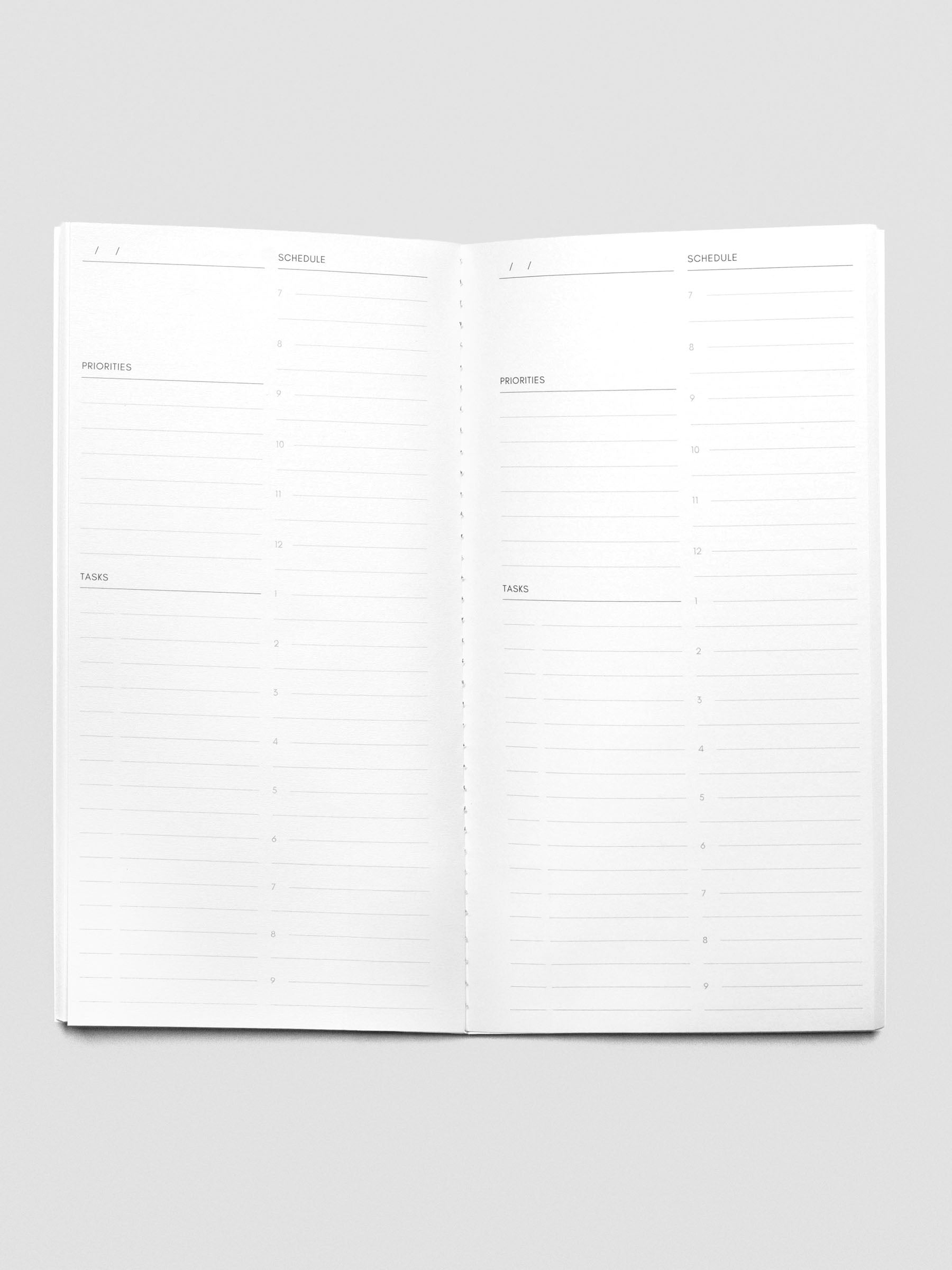 Travel Notebook in size A5 Slim in color Verona with Undated Daily pages with inner pages shown.