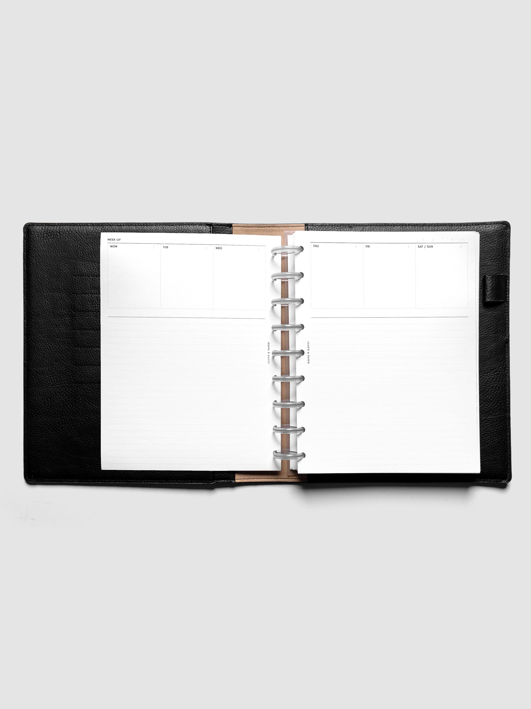 HP Classic Undated Weekly Notes Planner Inserts discbound in a black leather folio.